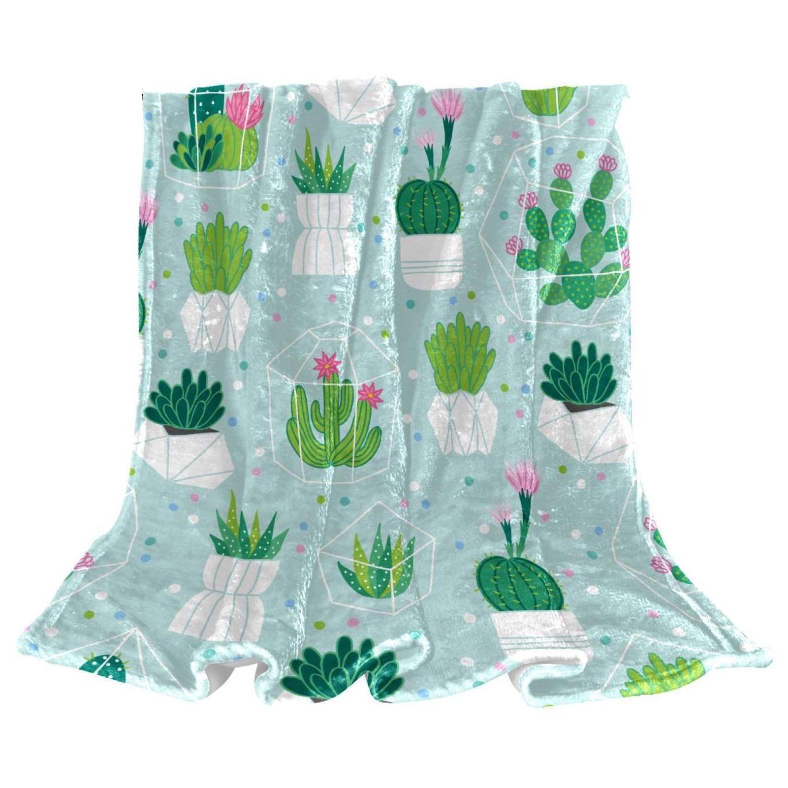 Couverture polaire cactus rose pour vos soirées cocooning sur le canapé