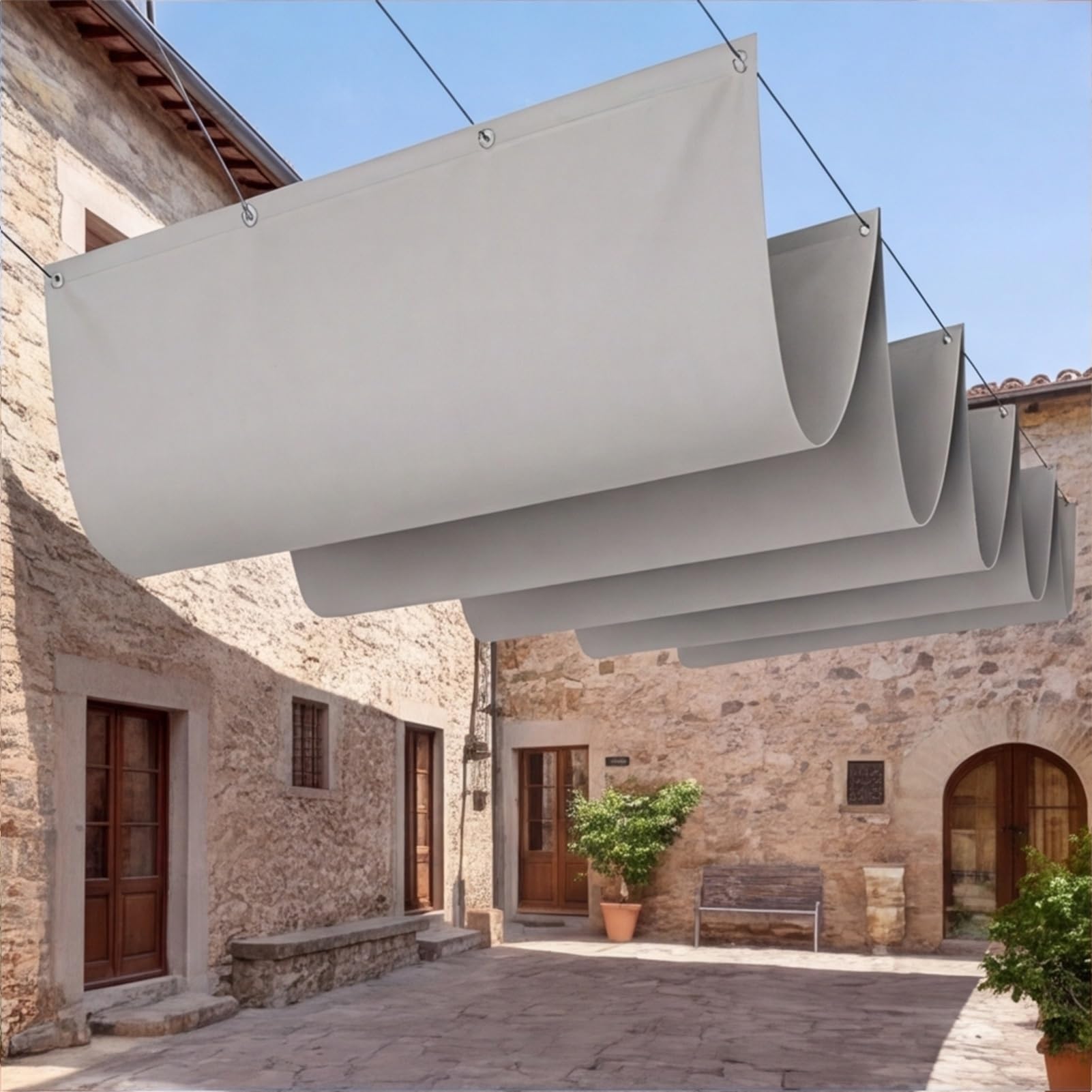 Voile d'ombrage rétractable fini la chaleur étouffante sous la pergola