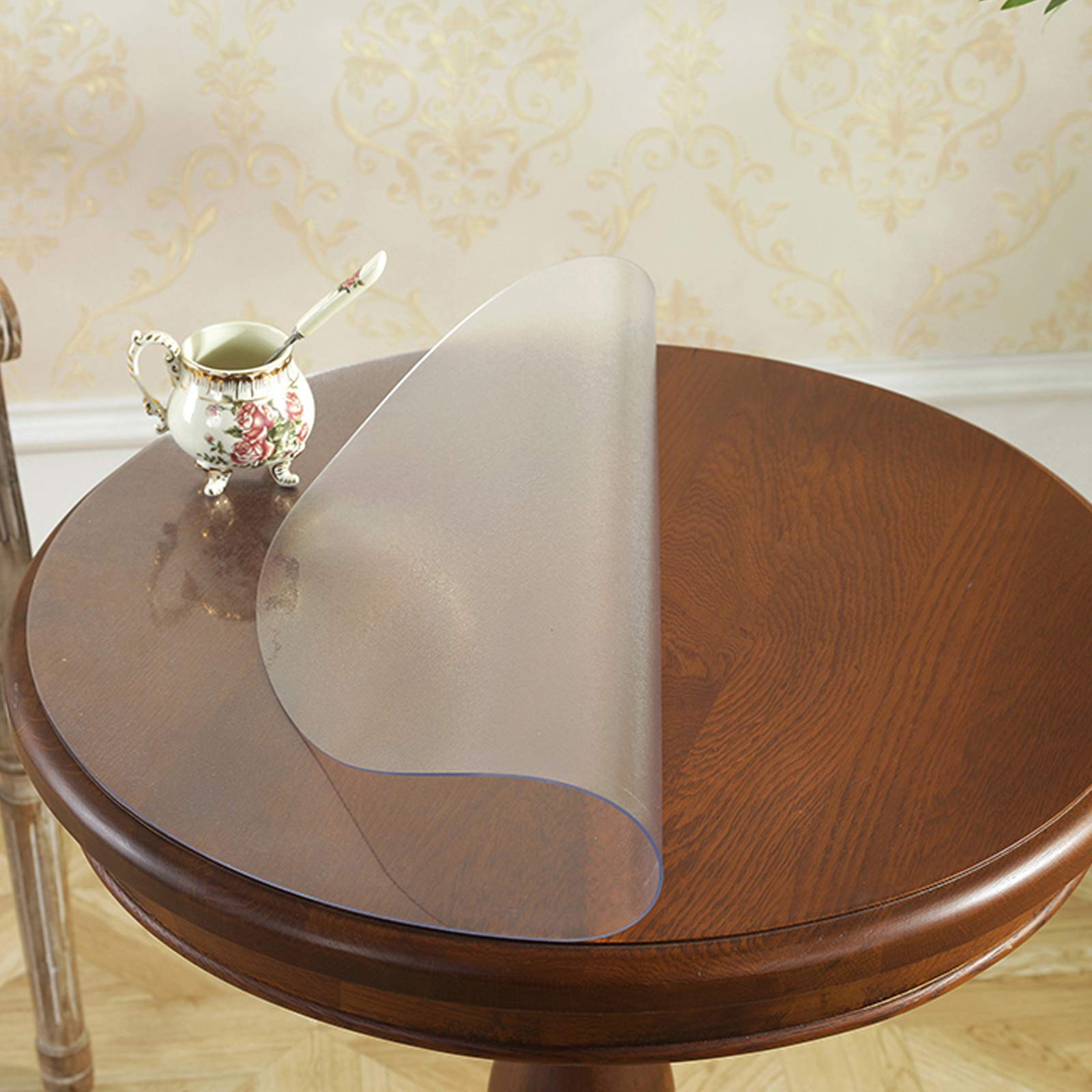 Nappe ronde ajustée pour protéger une table en bois des rayures