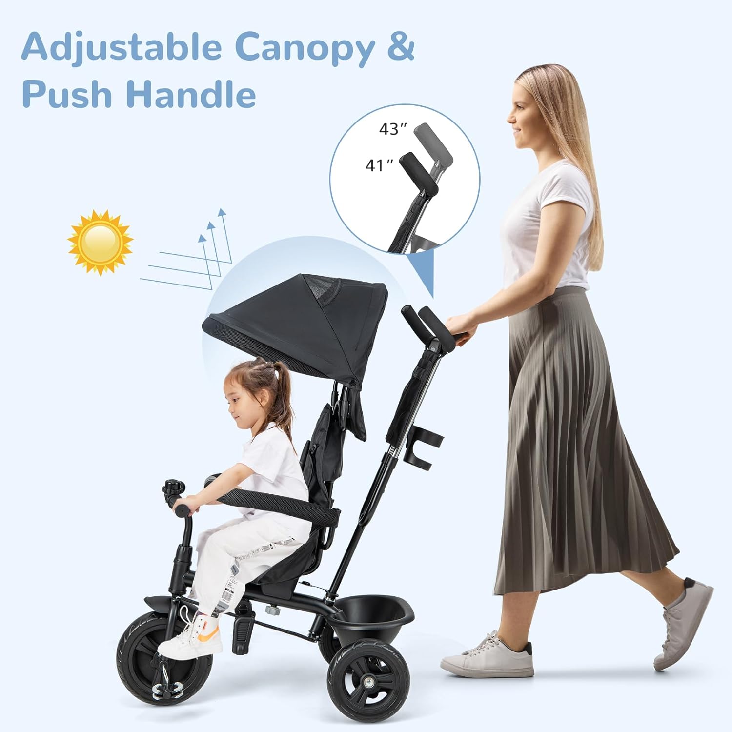 Image showing a parent adjusting the height of the push handle on the tricycle