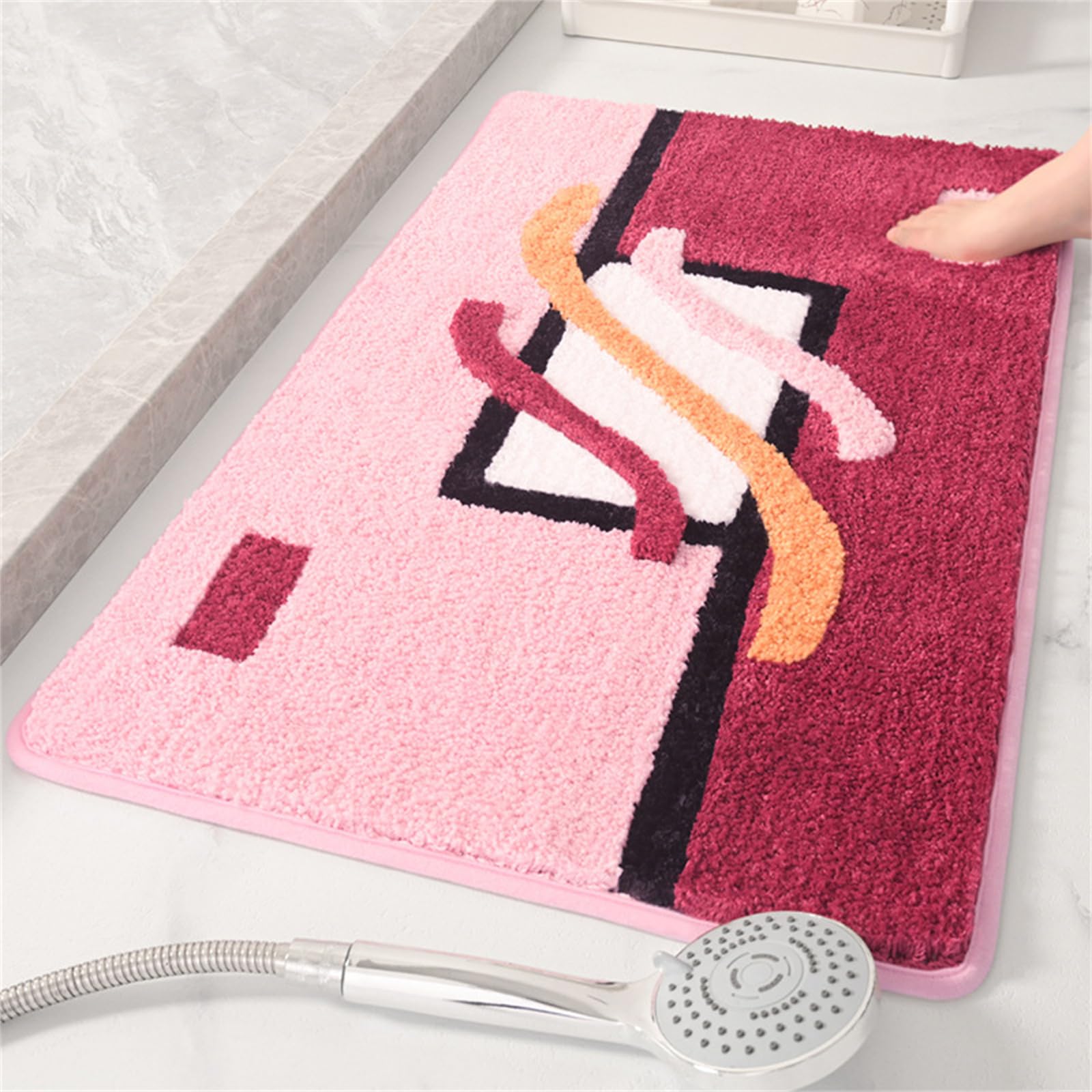 Tapis de douche shaggy antidérapant lavable en machine rose 40x60cm