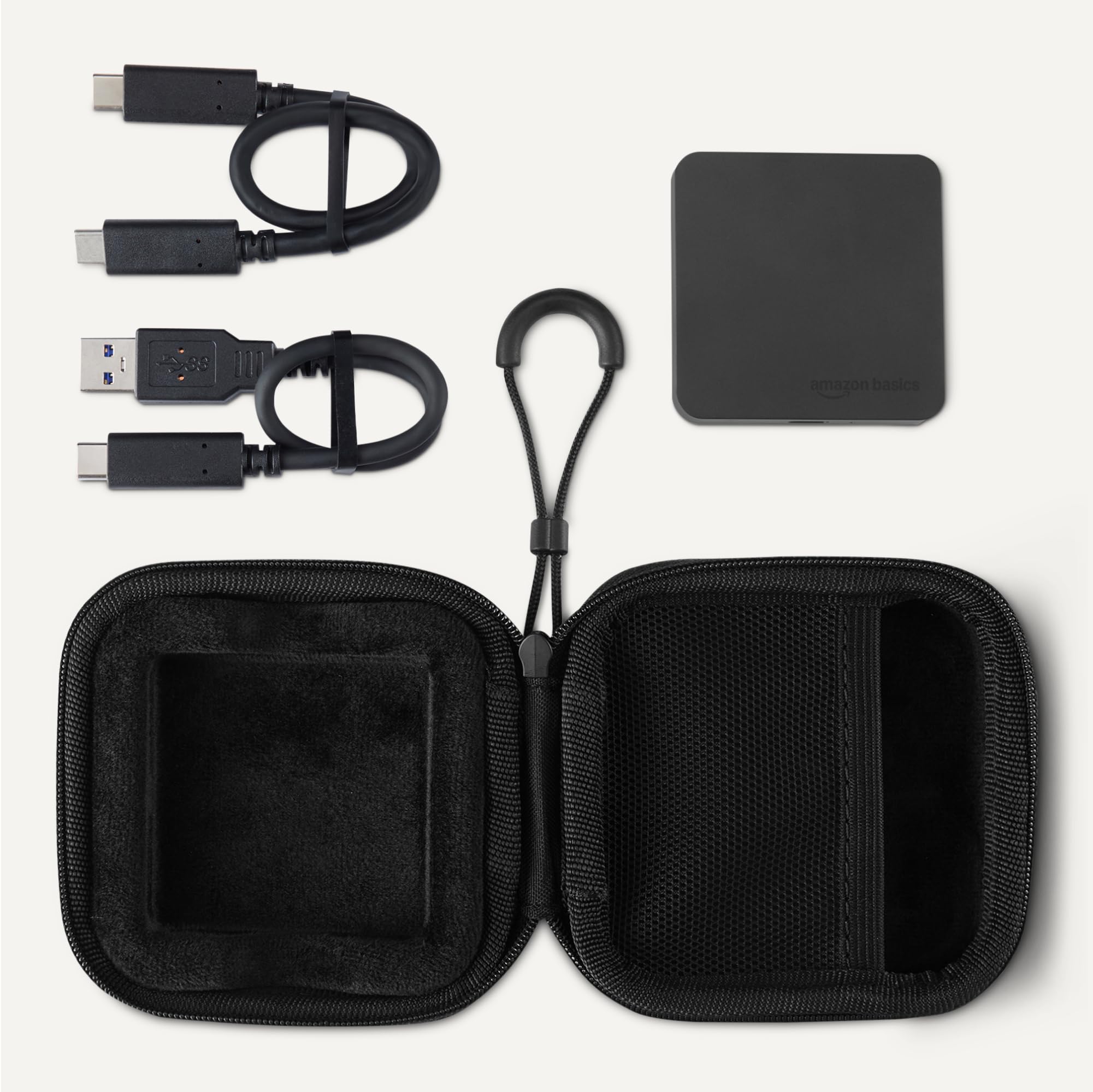 Amazon Basics Unidad de Estado Sólido Externa Portátil de 2TB Velocidades de hasta 2000MB/s USB 3.2 Gen 2 Resistencia IP65 al Agua y al Polvo Negro