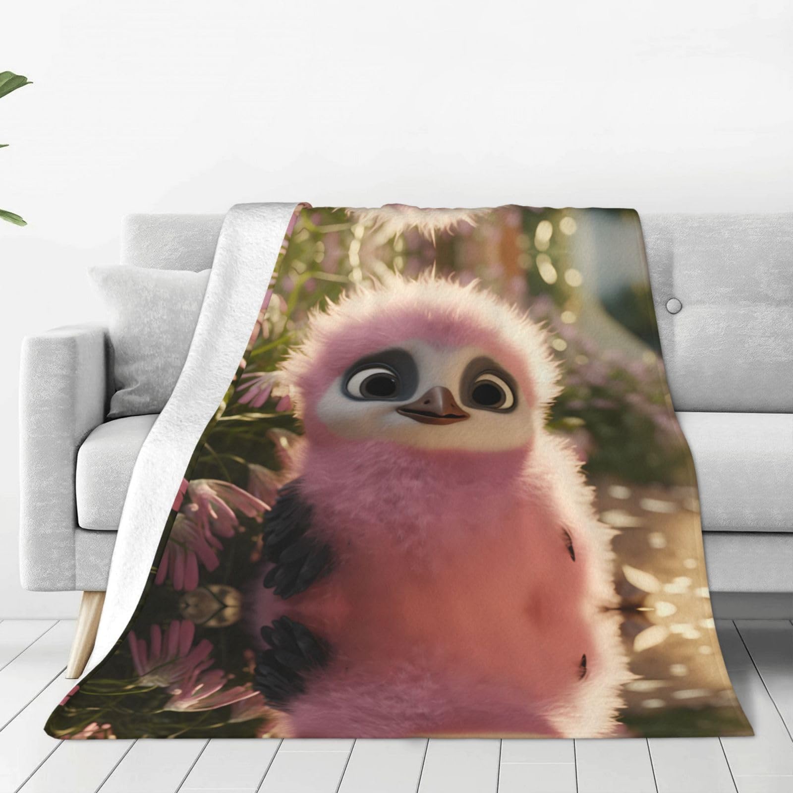 Couverture pingouin rose flanelle pour vos pauses déjeuner au bureau et salon