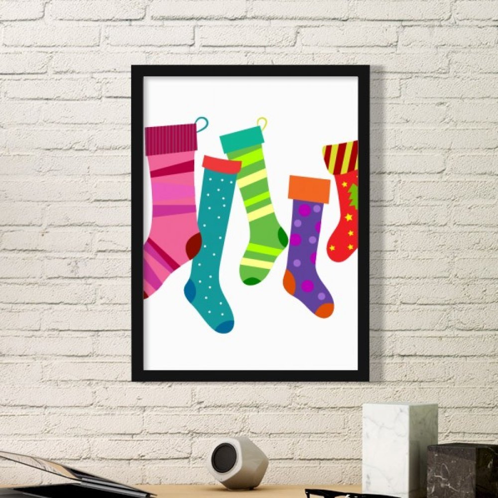 Illustration Joyeux Noël sous cadre noir pour sublimer la décoration murale du salon