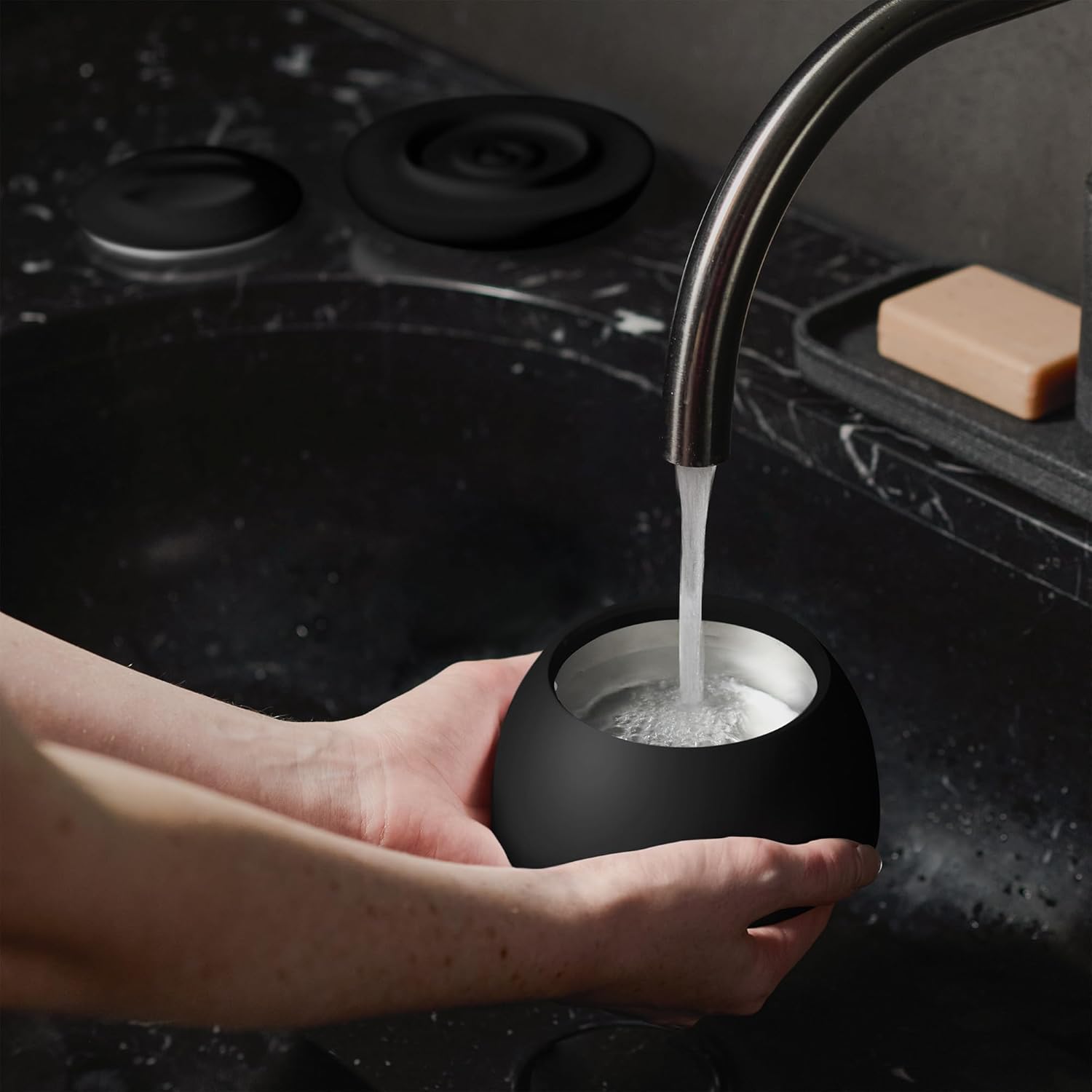 Hand filling the Zima Dental Pod PRO with water