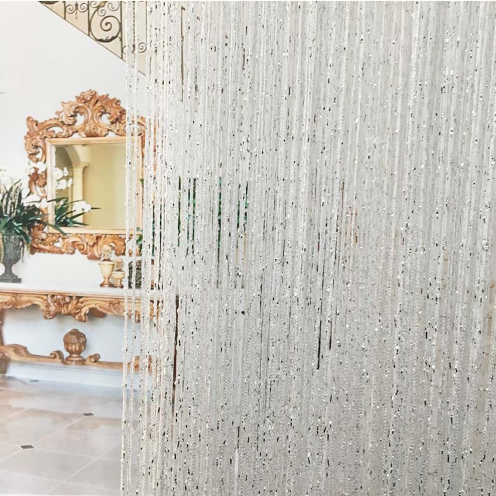 Rideau à pompons et perles de cristal pour sublimer vos fenêtres et salons