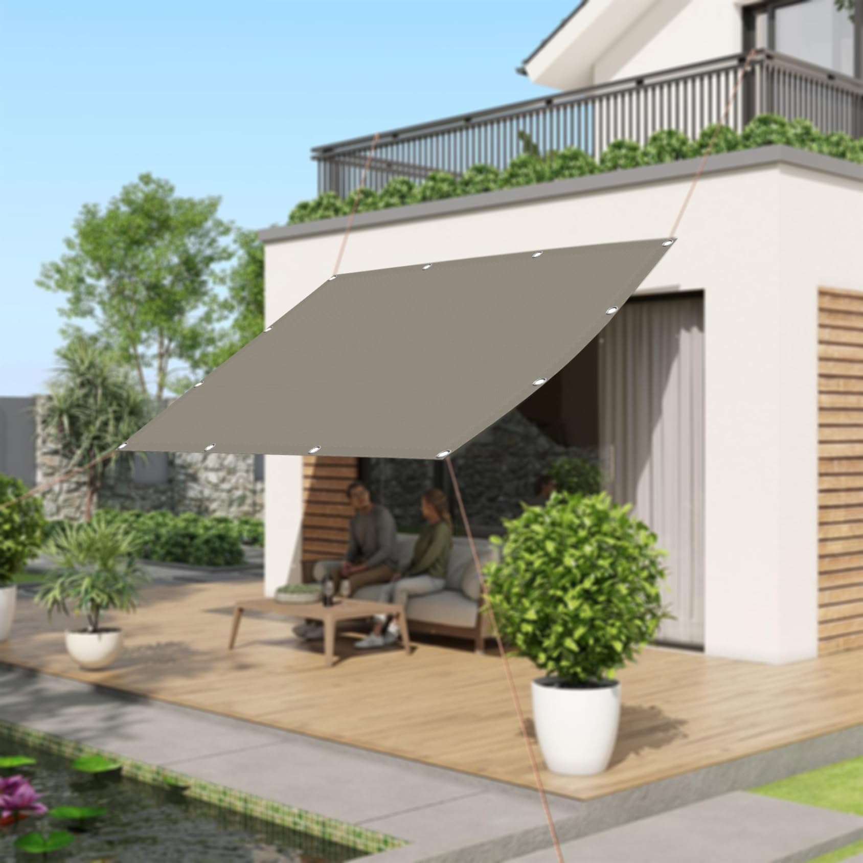 Voile ombrage rectangulaire taupe pour créer un coin repas frais au jardin