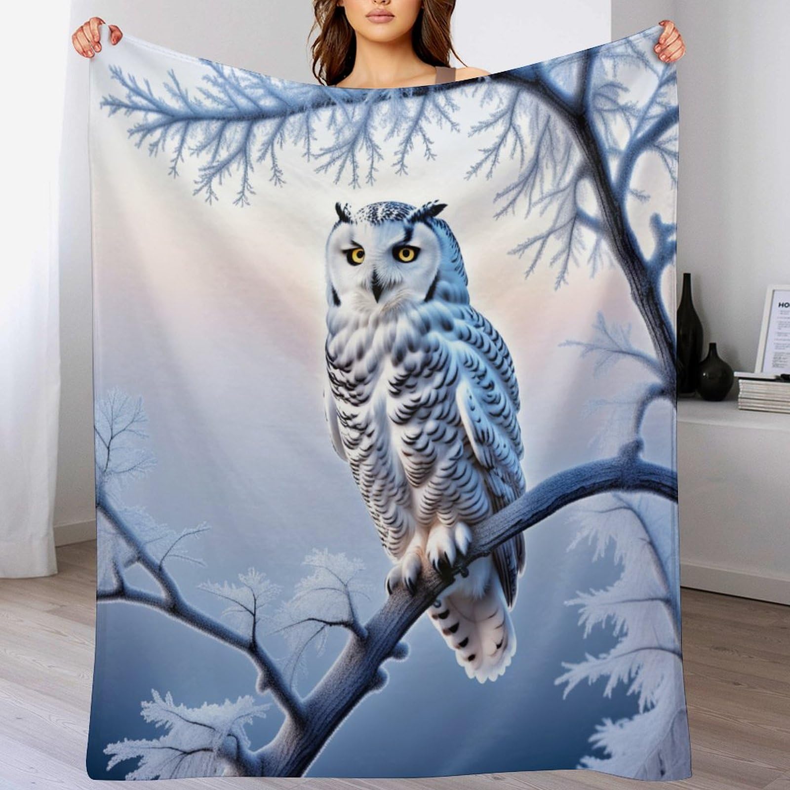 Couverture polaire hibou pour soirées cocooning et douceur sur le canapé