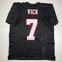 Vista 1 de Camiseta de fútbol americano negra retro de Atlanta de Michael Mike Vick con autógrafo/firmada JSA COA
