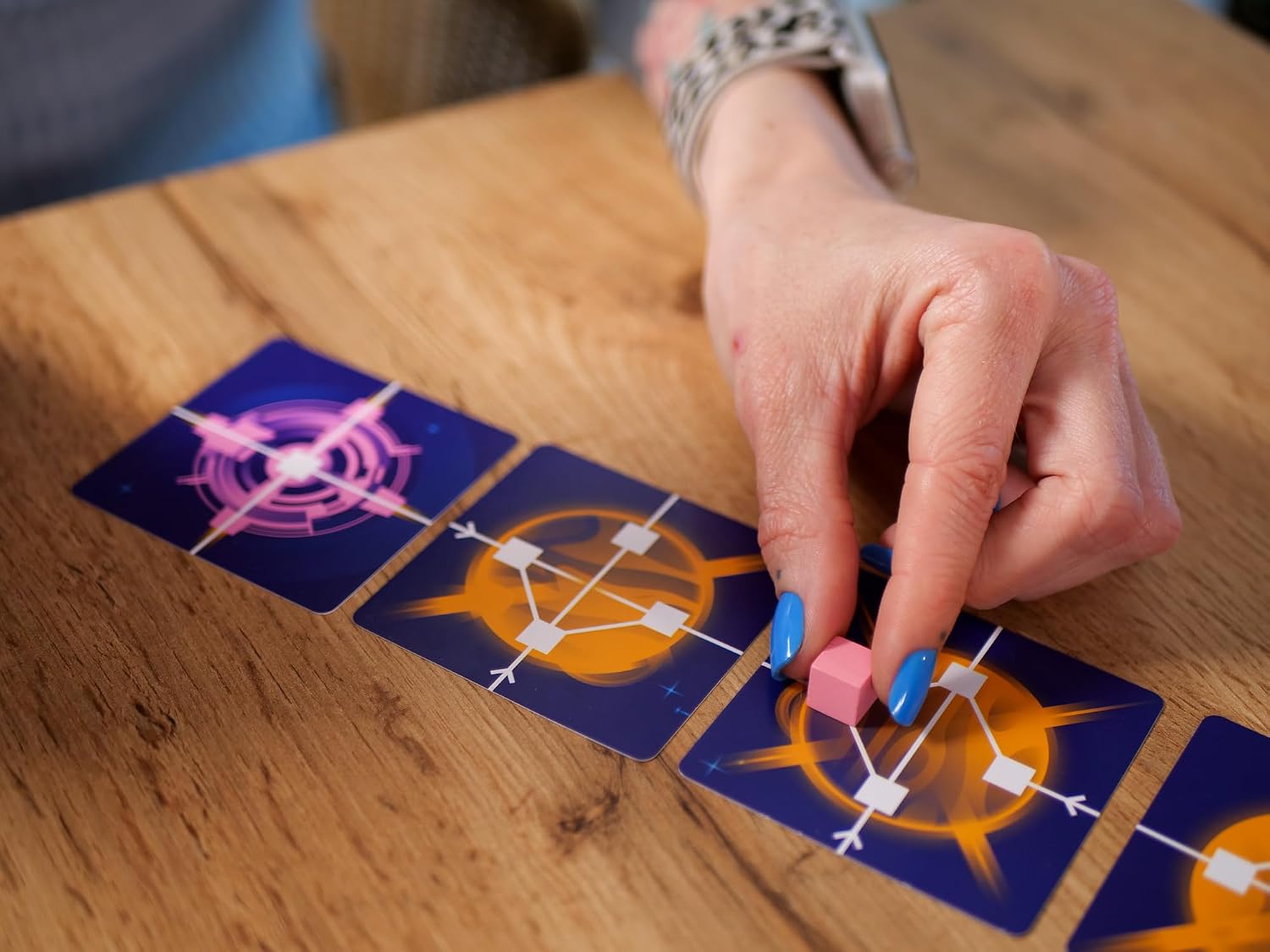 Player moving a token across the a_way galaxy