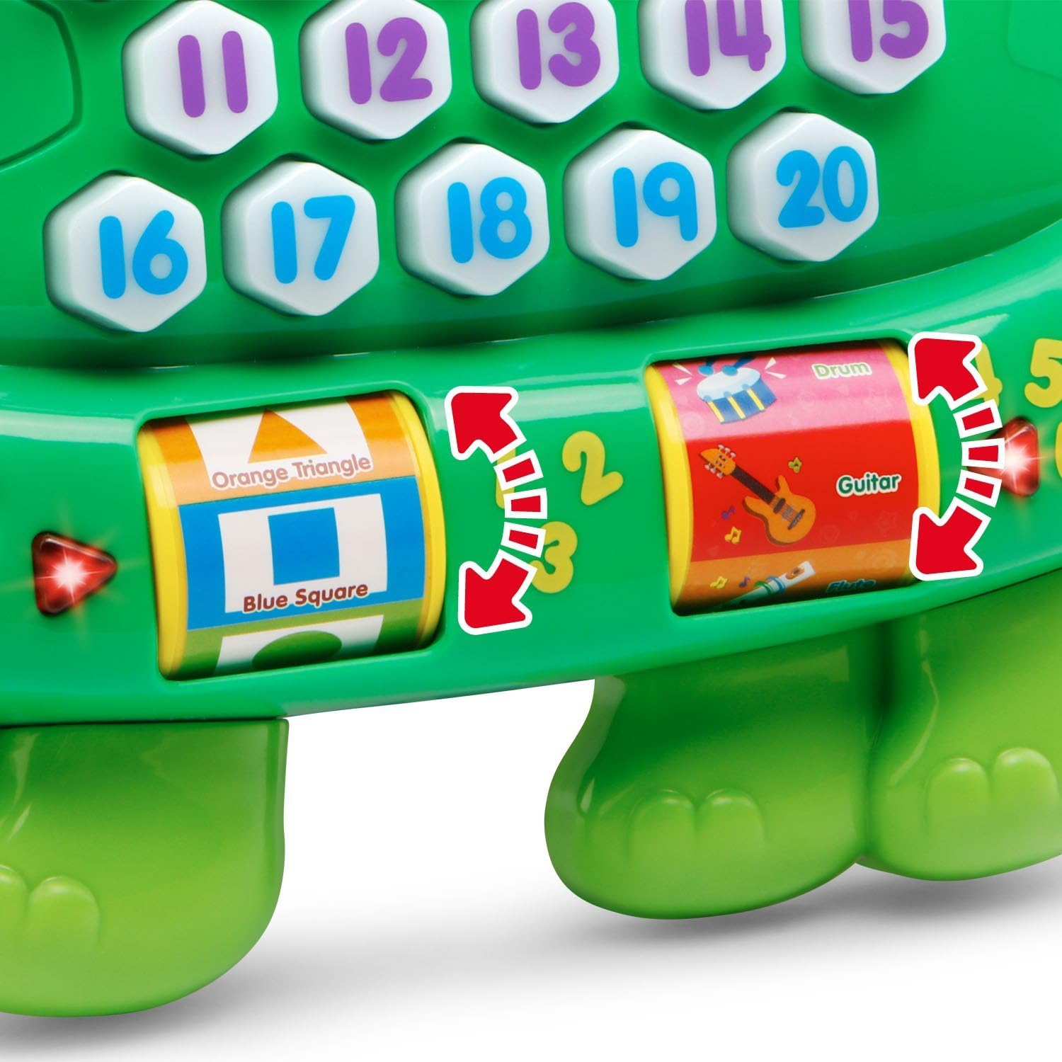 Close-up of the VTech Count and Learn Turtle's number buttons, with a speech bubble showing 'One!' and '¡Uno!' for bilingual learning.