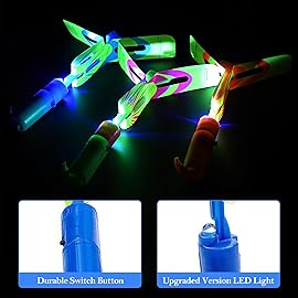 Rocket Slingshot Flying Toys with LED Lights - 12 Pcs Kids Outdoor Game with 12 Launchers + 12 Arrow Helicopters, Glow in The Dark Party Supplies