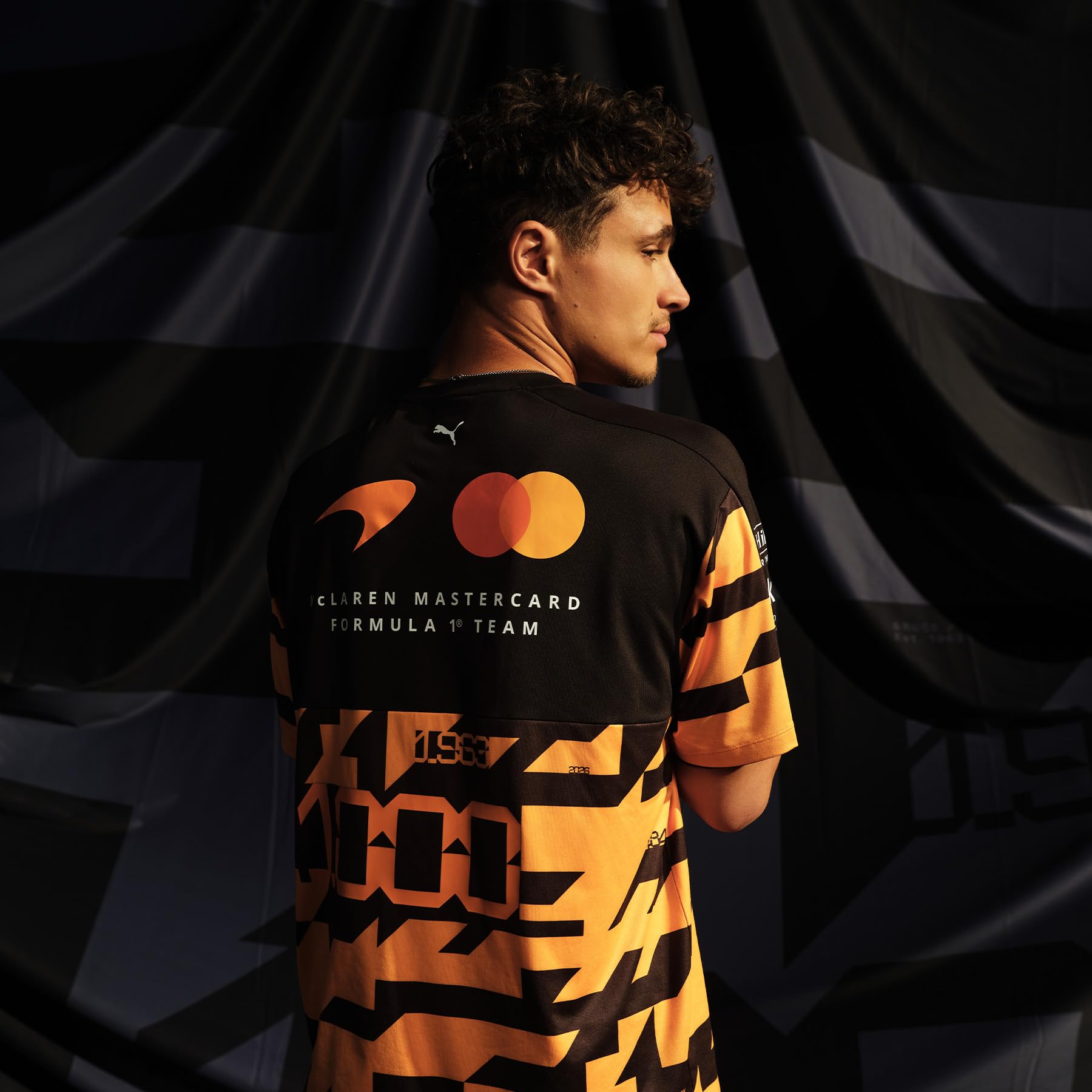 PUMA McLaren F1 2026 T-Shirt Edizione Speciale 1000° GP - Arancione
