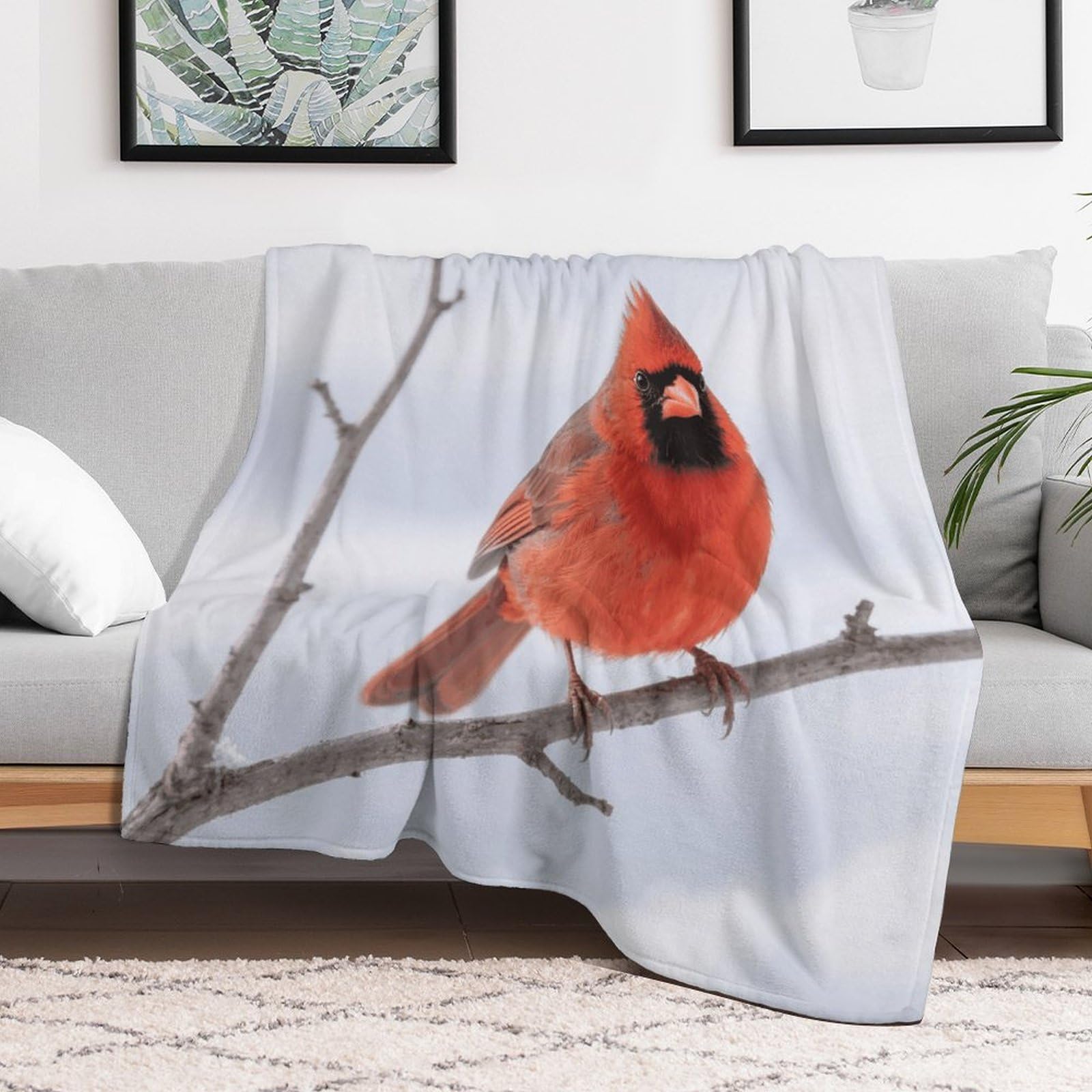 Couverture polaire douce pour soirées cocooning sur le canapé du salon