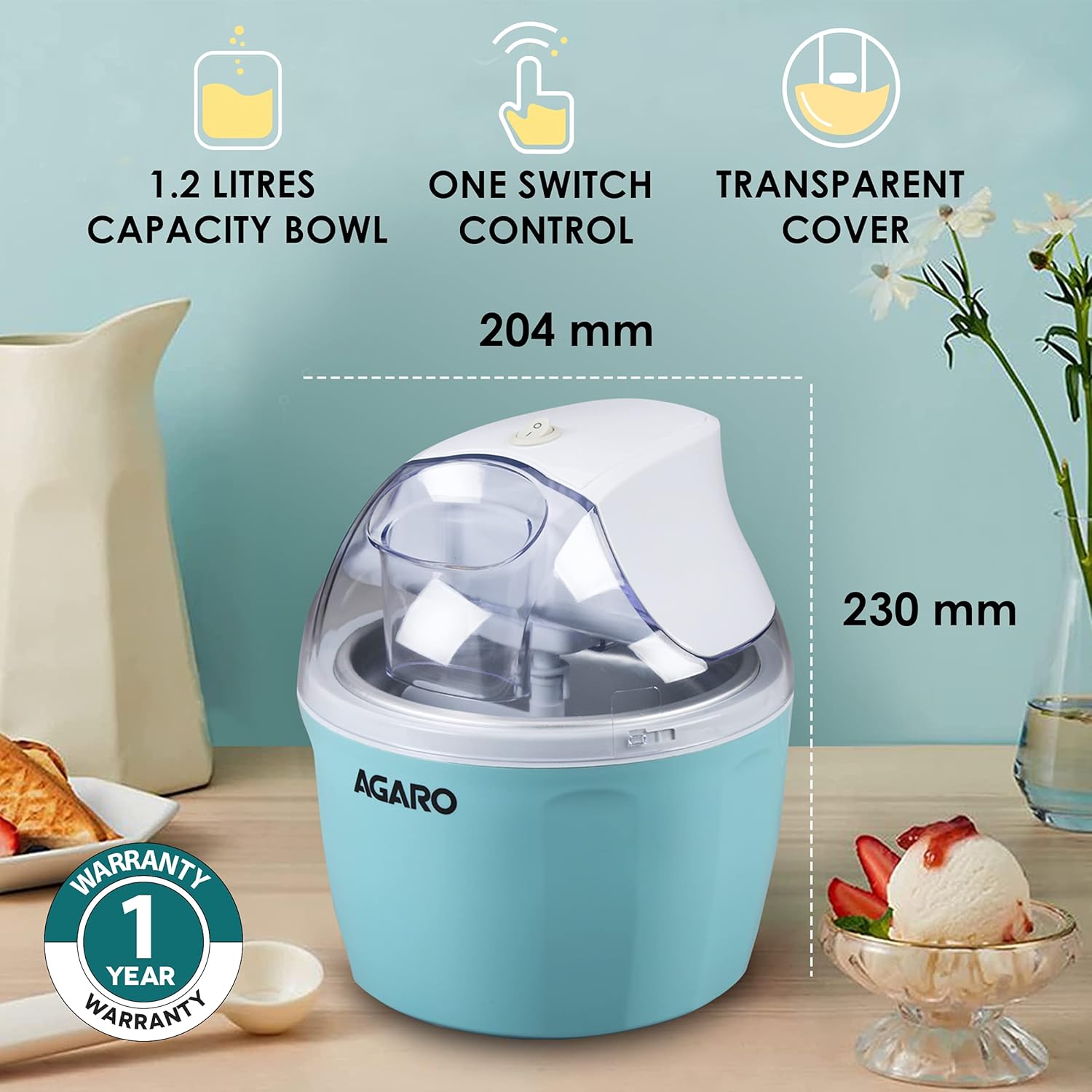 Image showing the AGARO Ice Cream Maker with its 1.2 litres capacity bowl, one switch control, transparent cover, and dimensions (204mm x 230mm). A '1 Year Warranty' badge is also visible.