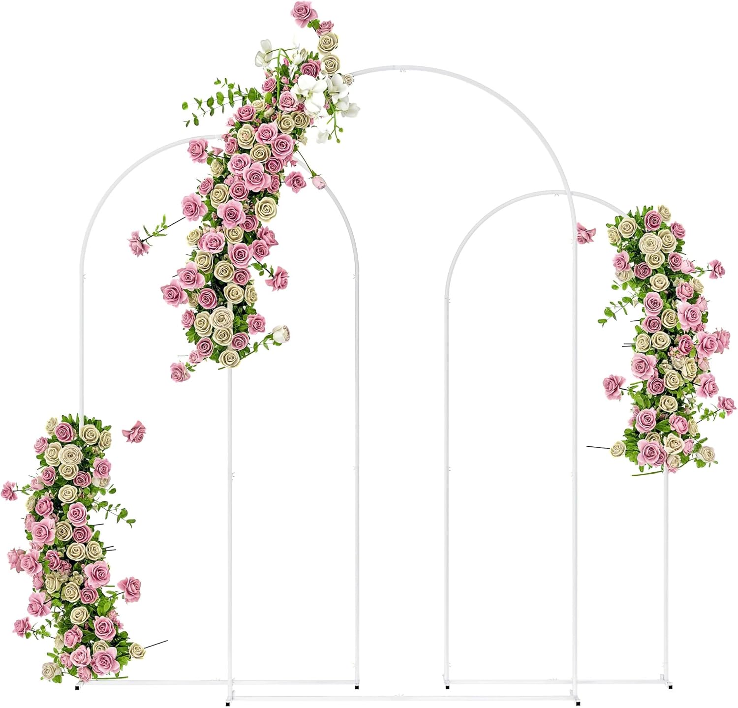 Three white metal arch backdrop stands decorated with pink and white floral arrangements.