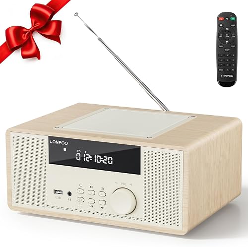 Cream wood-effect LONPOO cabinet with a telescopic aerial, a large round dial and a display, shown with a remote and a red gift ribbon