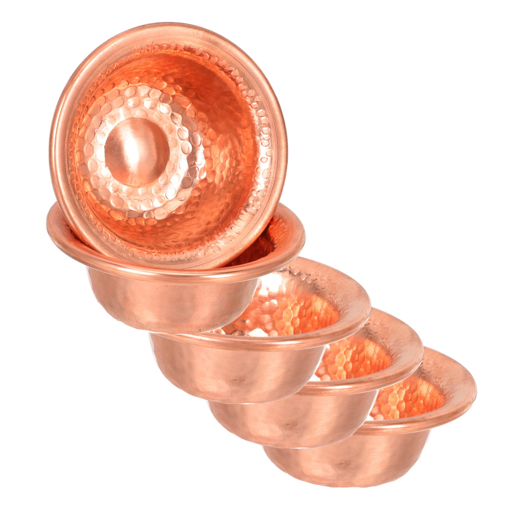 Cuencos pequeños de cobre que solucionan la falta de espacio para el altar de meditación