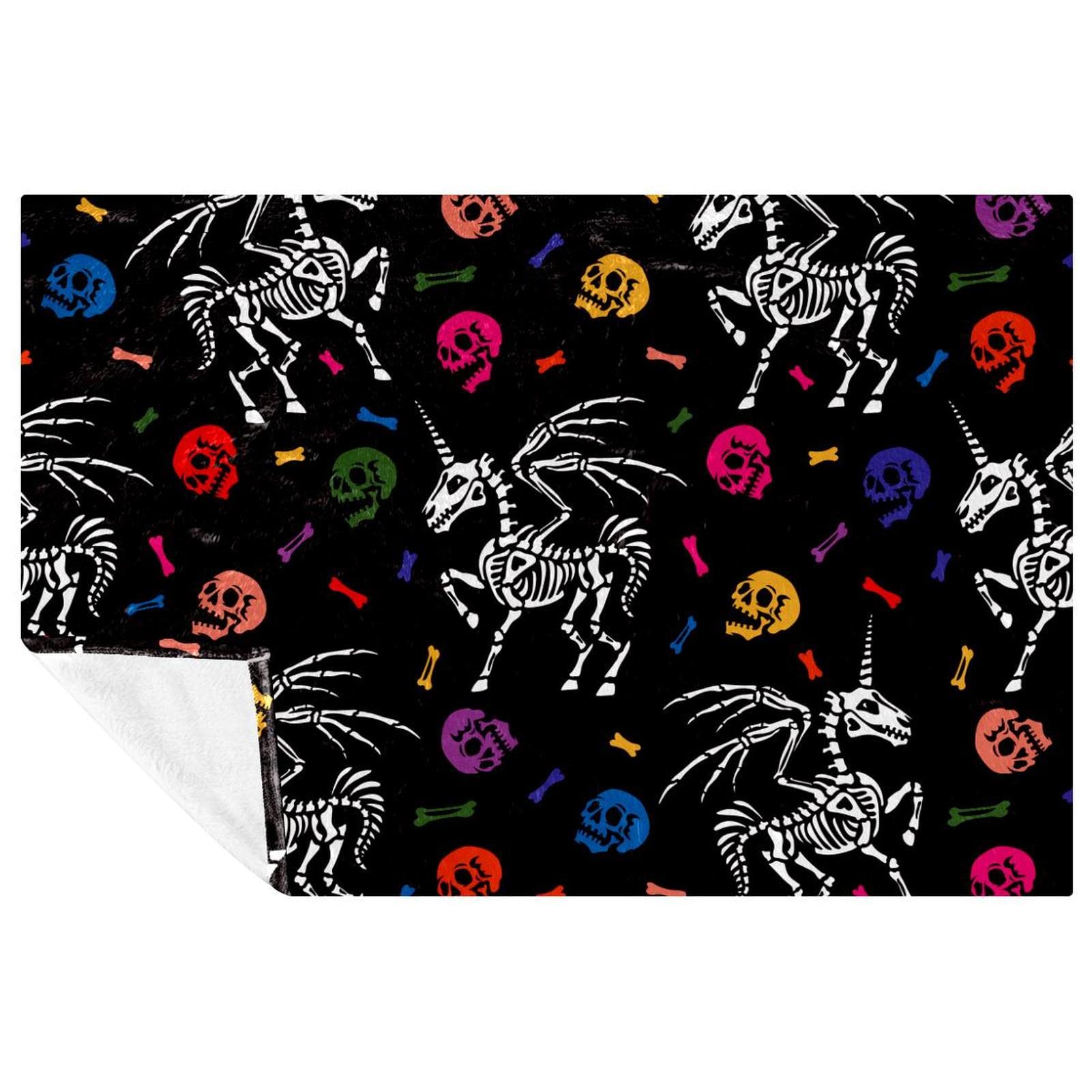Plaid squelette licorne chaud pour stopper le froid sur le canapé