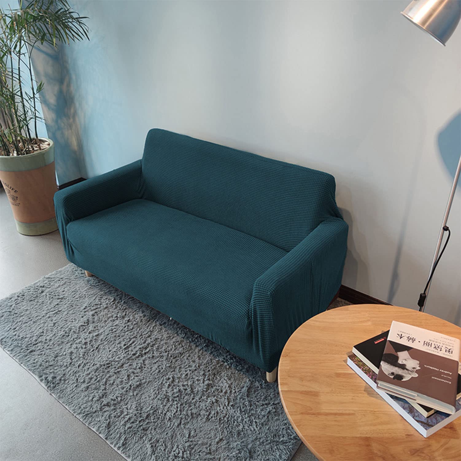 Housse de canapé extensible jacquard vert pour rénover un fauteuil