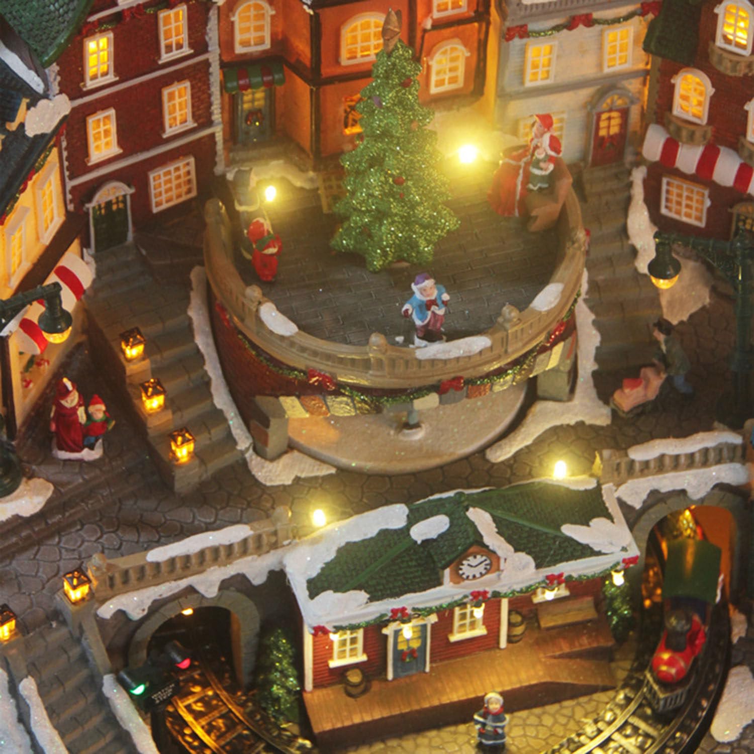 Edifici del Villaggio di Natale con Treno Girevole e Albero di Natale Girevole con luci LED Colorate e Musica Natalizia per Decorazioni da Tavolo per Le Feste di Natale al Chiuso