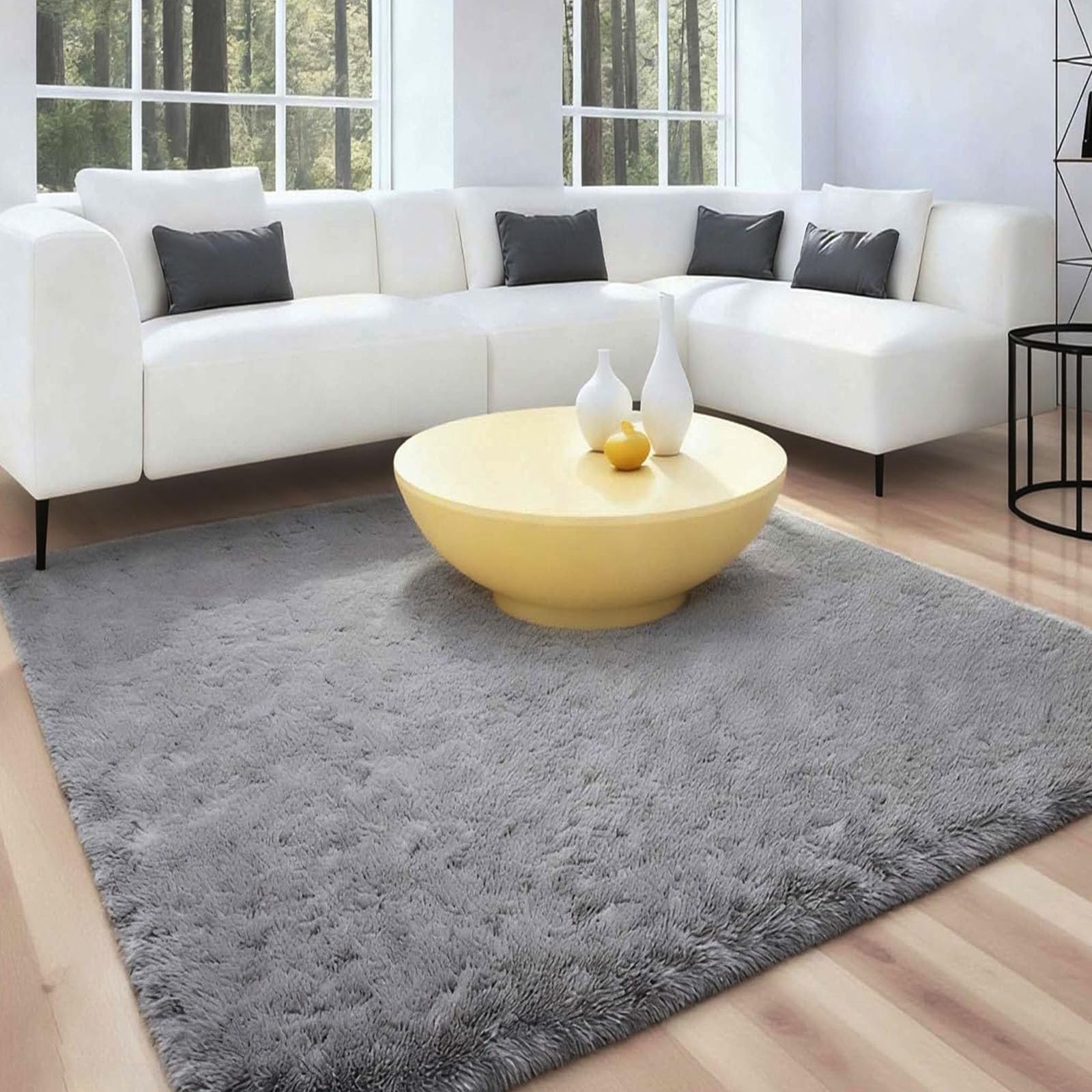 Tapis de salon moderne gris pour réchauffer l'ambiance de la maison