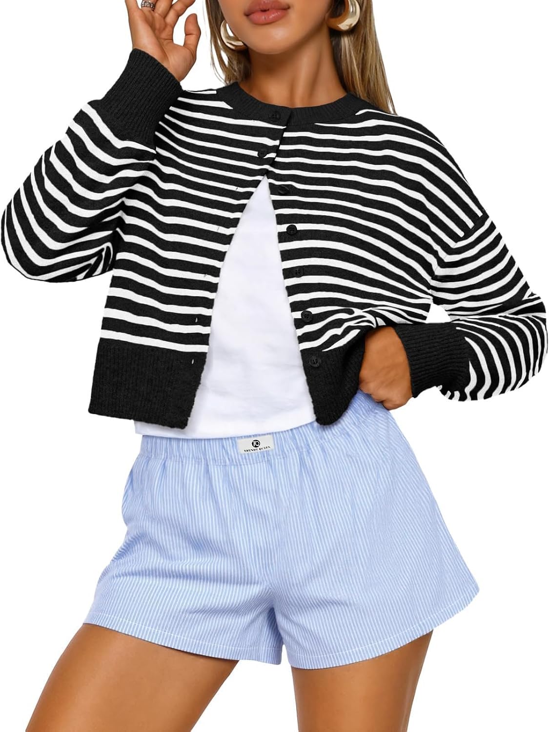 Women's Short Knitted Cardigan Sweater, a Fashionable Autumn Dress with Buttons and a Crop top Made Black