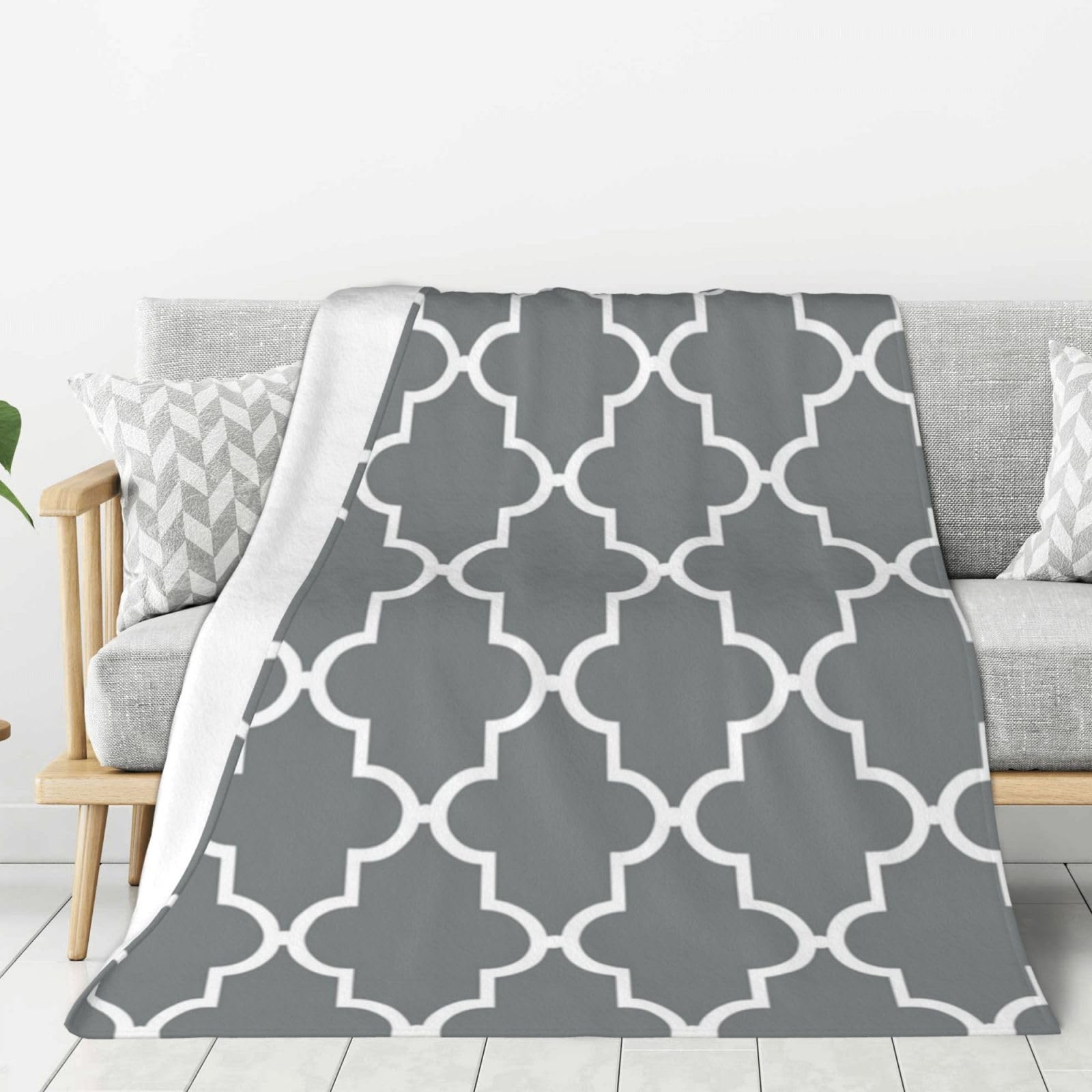 Couverture pour canapé et soirées cocooning en polaire douce