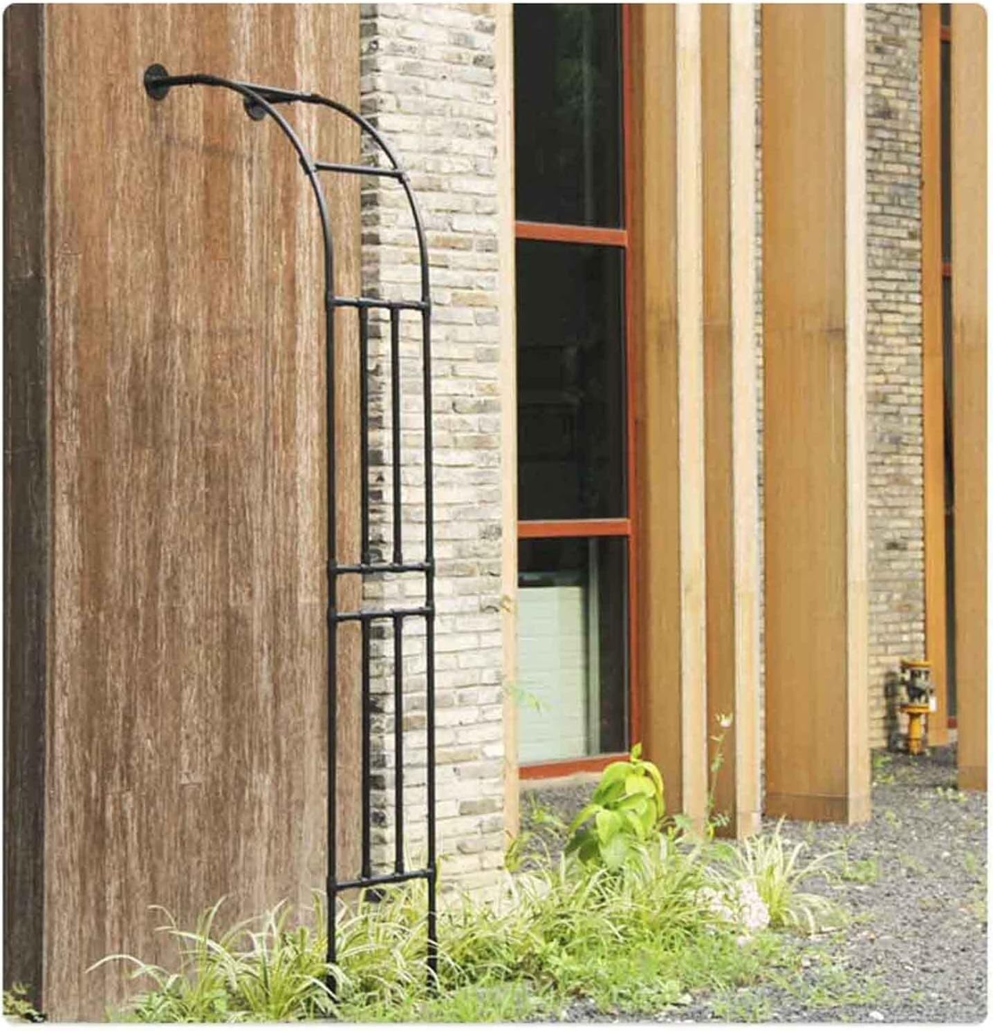 Arche rose tonnelle de jardin pour une cour fleurie romantique