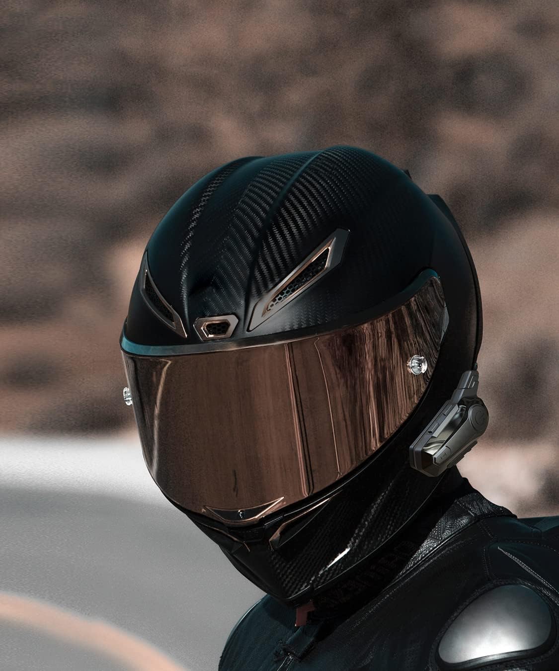 eECO-FLYING X1 headset mounted on a black motorcycle helmet.