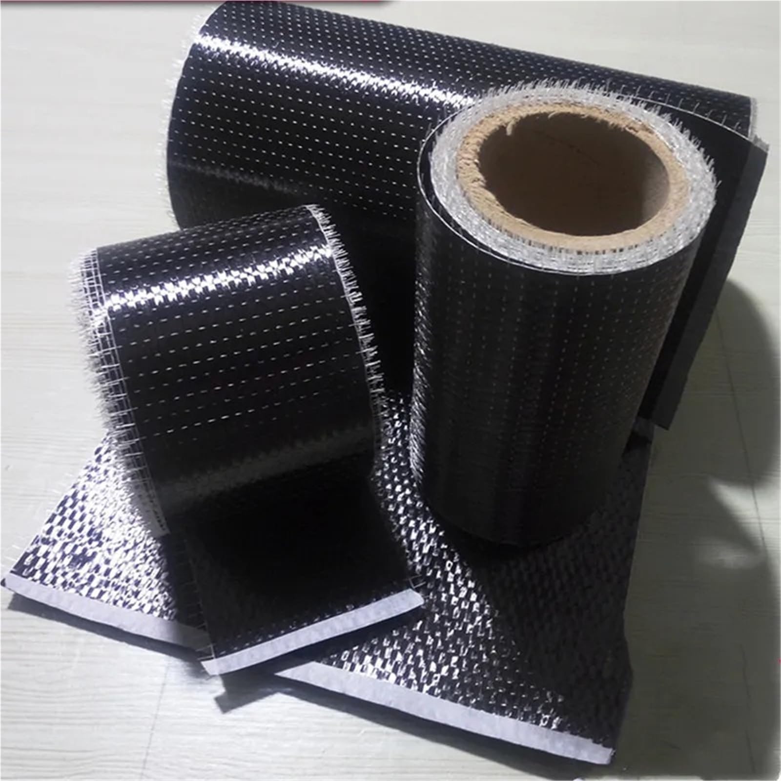 Tela de la reparación de la anchura del paño 300gsm 200gsm los 50cm los 30cm de la fibra de carbono de T700 12K UD(300gsmx50cmx180cm)