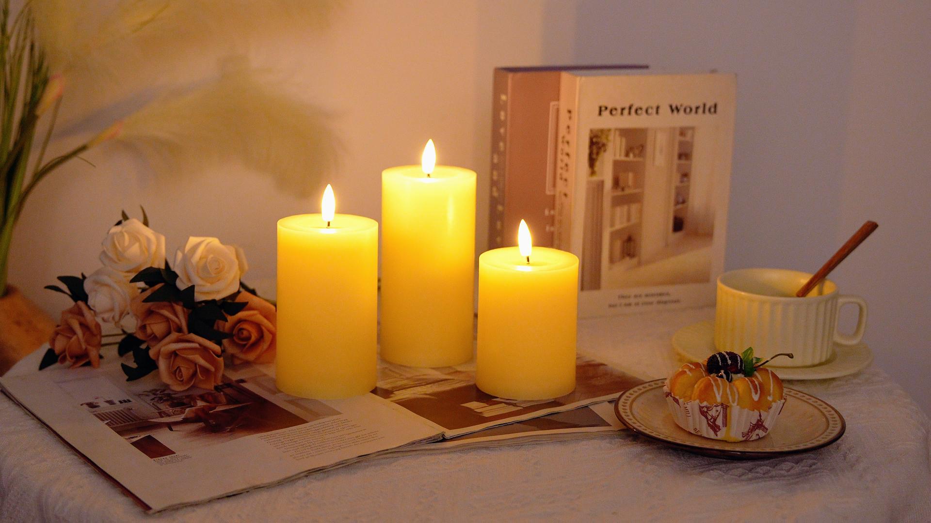 Image of JHY DESIGN Flickering Flameless Candles Battery Operated with 10-Key Remote & 2 /4 /6 /8-Hour Timer, Real Wax Pillar Grease Effect LED Candles Set for Chrismas /Home Decorations(Ivory)
