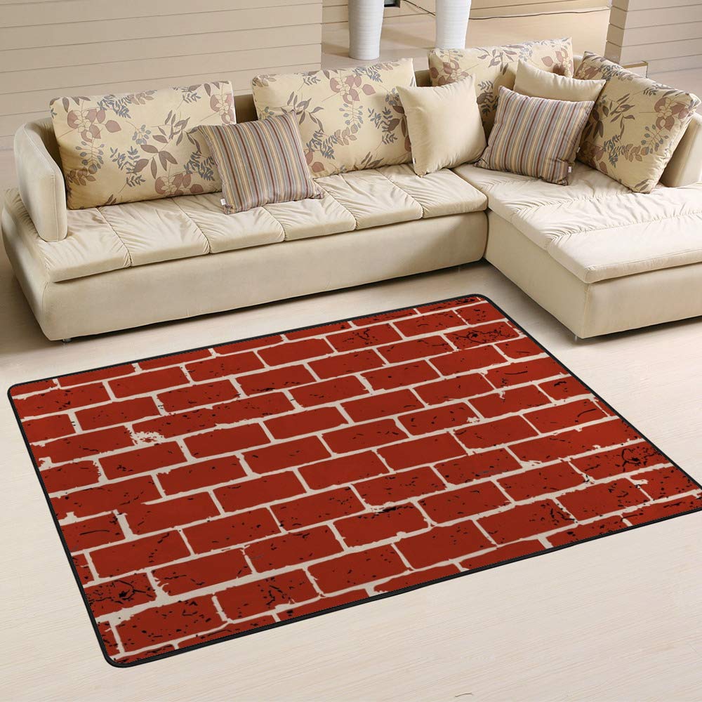 Tapis motif brique grand format pour protéger le sol du salon facilement