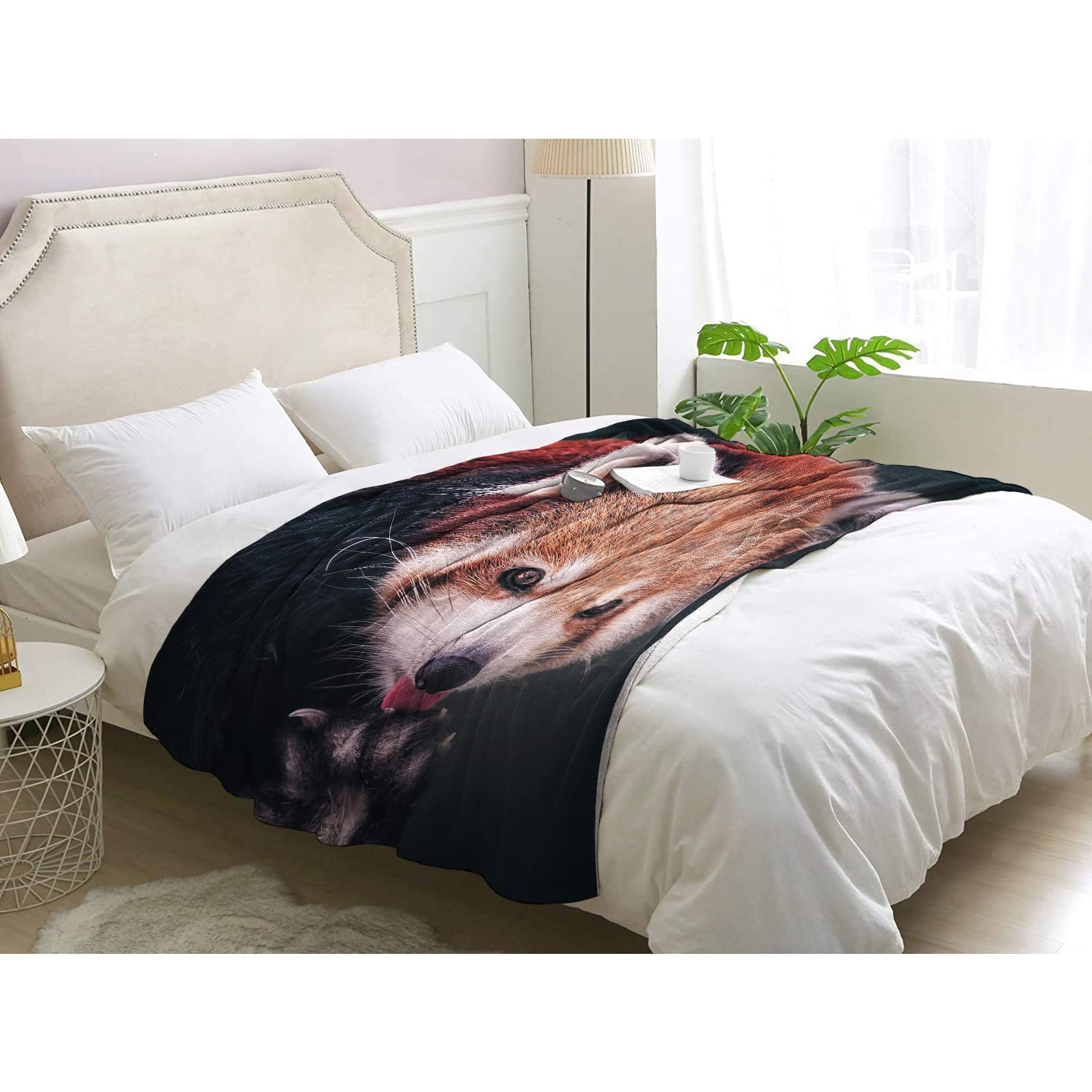 Couverture polaire panda rouge pour réchauffer vos soirées cinéma sur le canapé