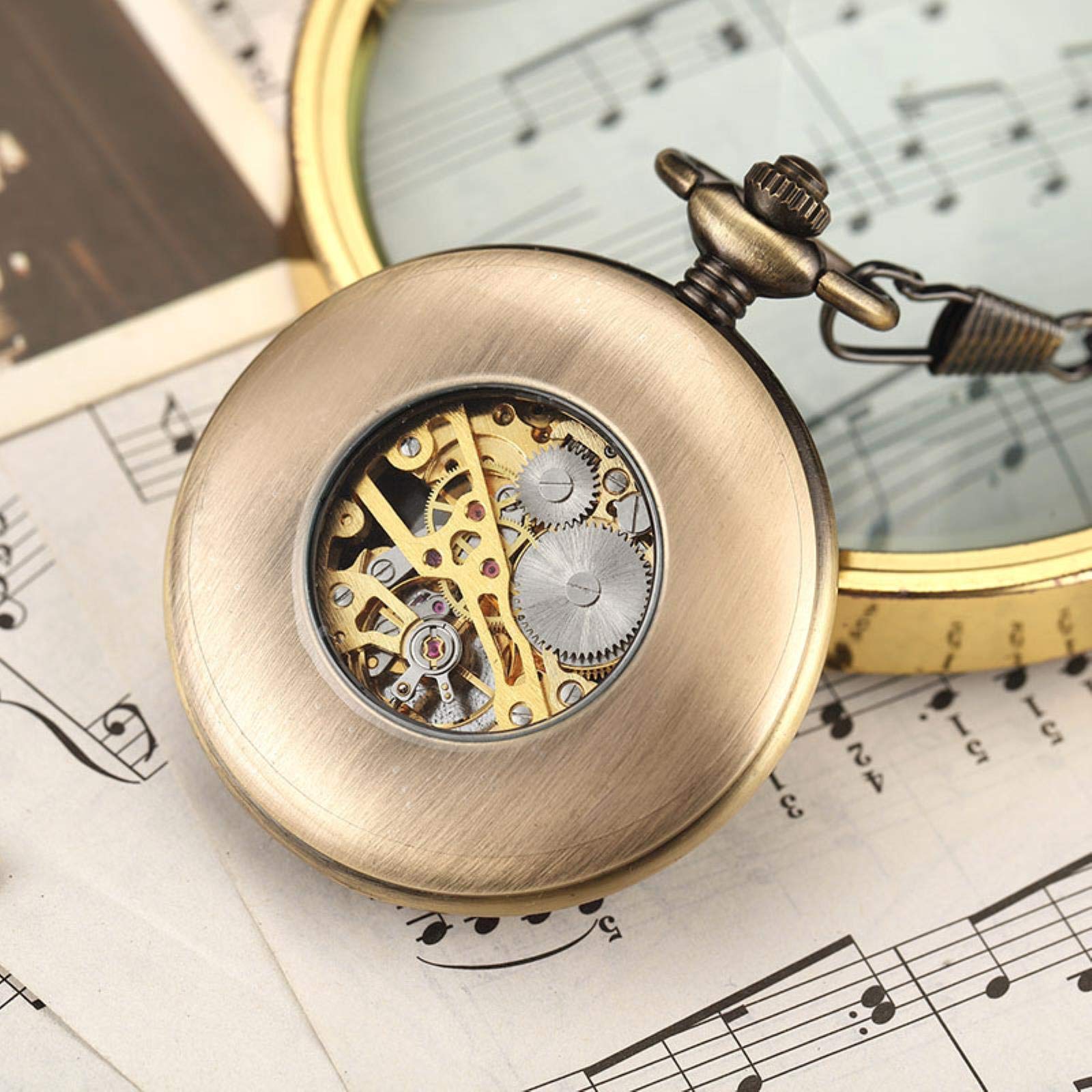 Orologio da tasca con catena e medaglione, quadrante cavo