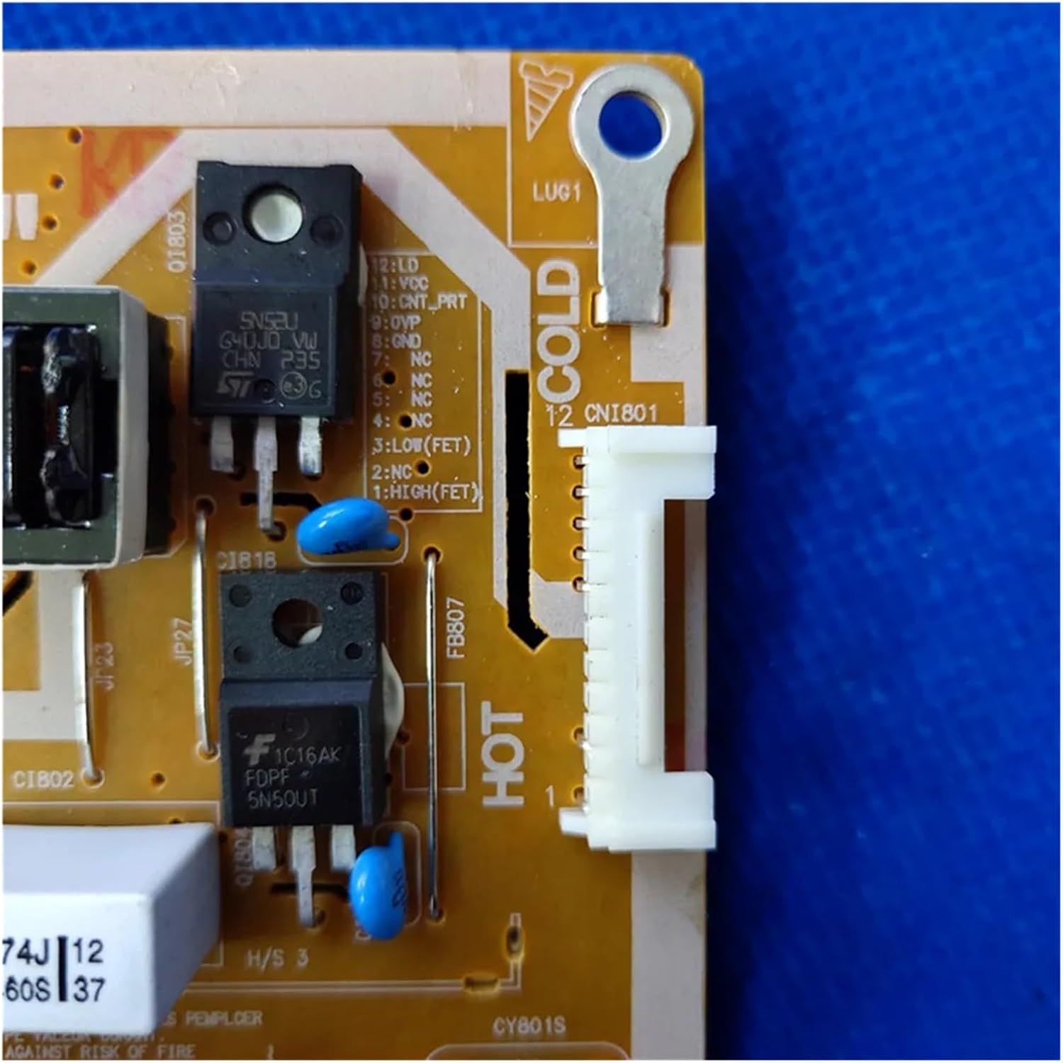 Close-up of 12-pin connector on TV Power Board with HOT/COLD markings