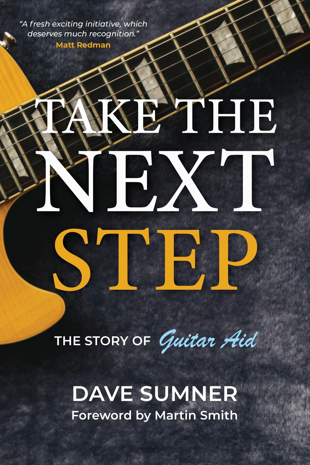 Take the Next Step The story of Guitar Aid by Dave Sumner (Paperback Book)