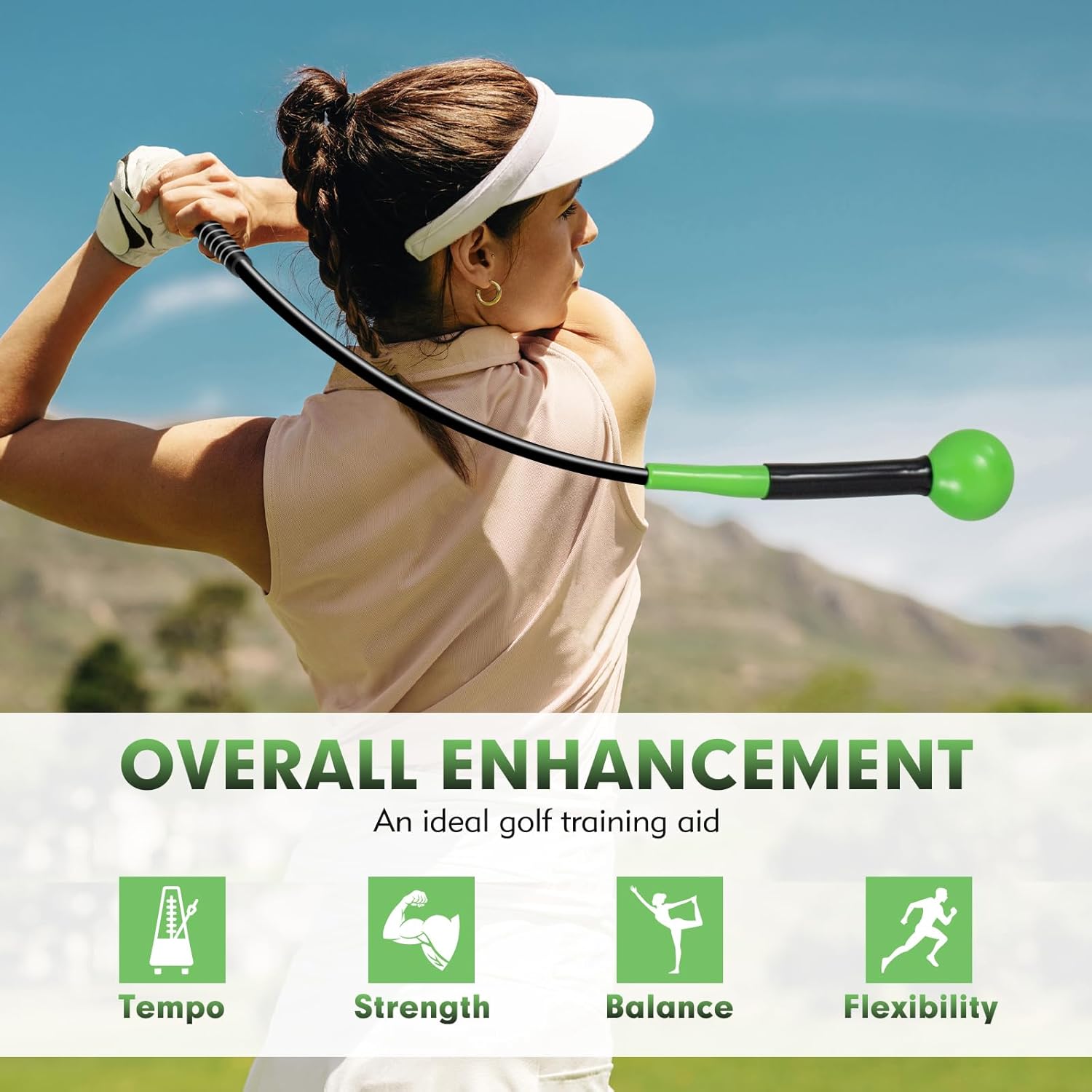 A woman warming up with the golf swing trainer on a golf course