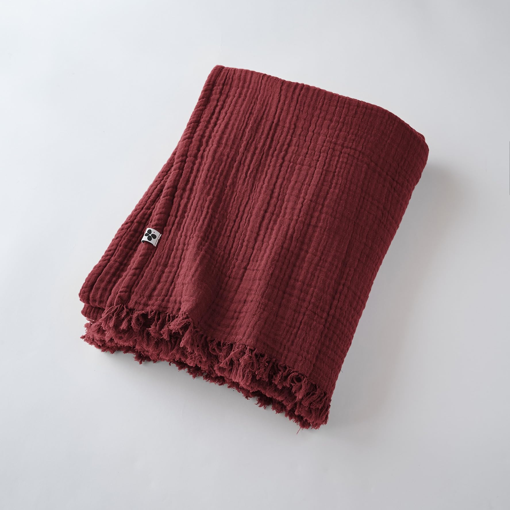 Plaid con frange in garza di cotone, 130 x 160 cm Gaia Bordeaux