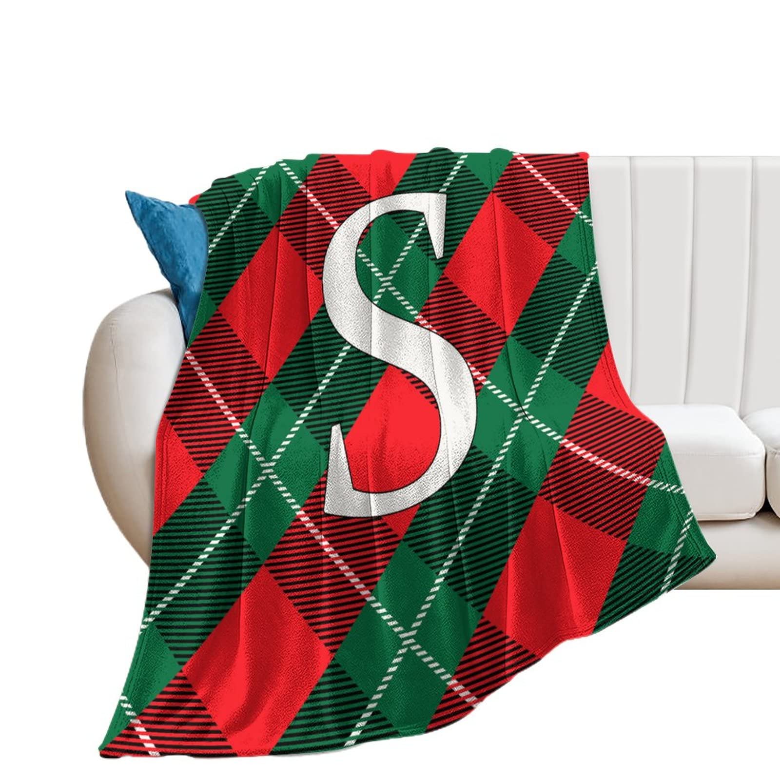 Plaid buffle initiale S : fini les pieds froids sur votre canapé ou lit