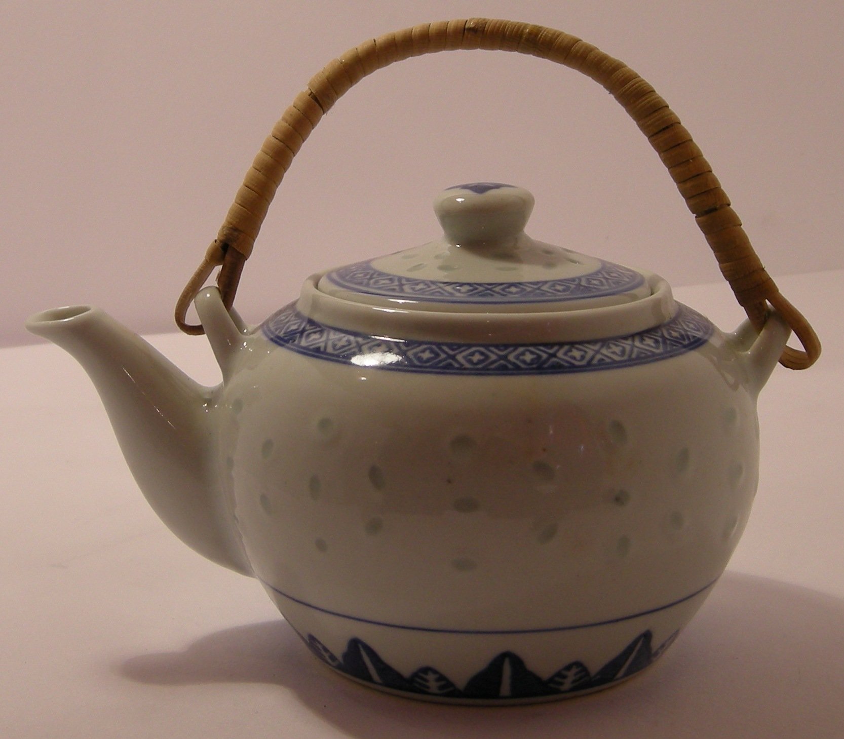 Tea Pot 600cc Rattan Handle Ceramic Rice Pattern Guaranteed quality