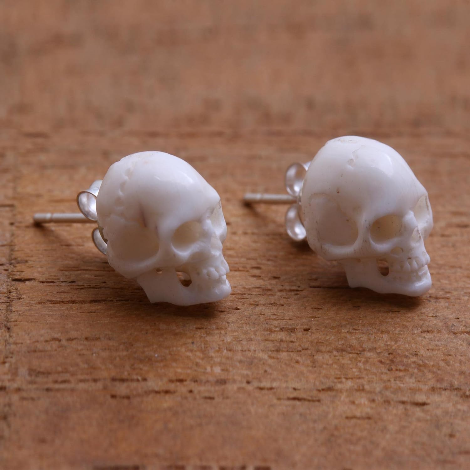 NOVICA Handmade .925 Sterling Silver Bone Stud Earrings Skull shaped Crafted Bali Indonesia Halloween Day of The Dead [0.4 in L x 0.3 in W x 0.3 in D] 'Trunyan Skulls'