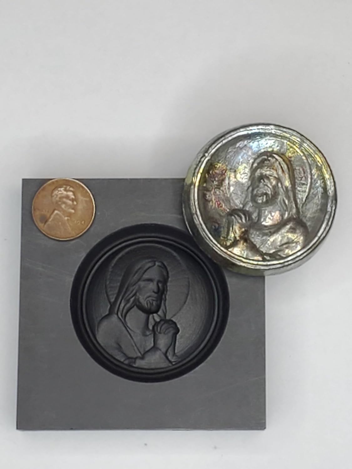 Graphite Mold Jesus II This Mold is Ideal for Casting a 3D Image. Works Great with Gold, Silver, Copper, Aluminum, Tin, and Other Precious and Non-Precious Metals. As Well as Pressing Glass. Ingot