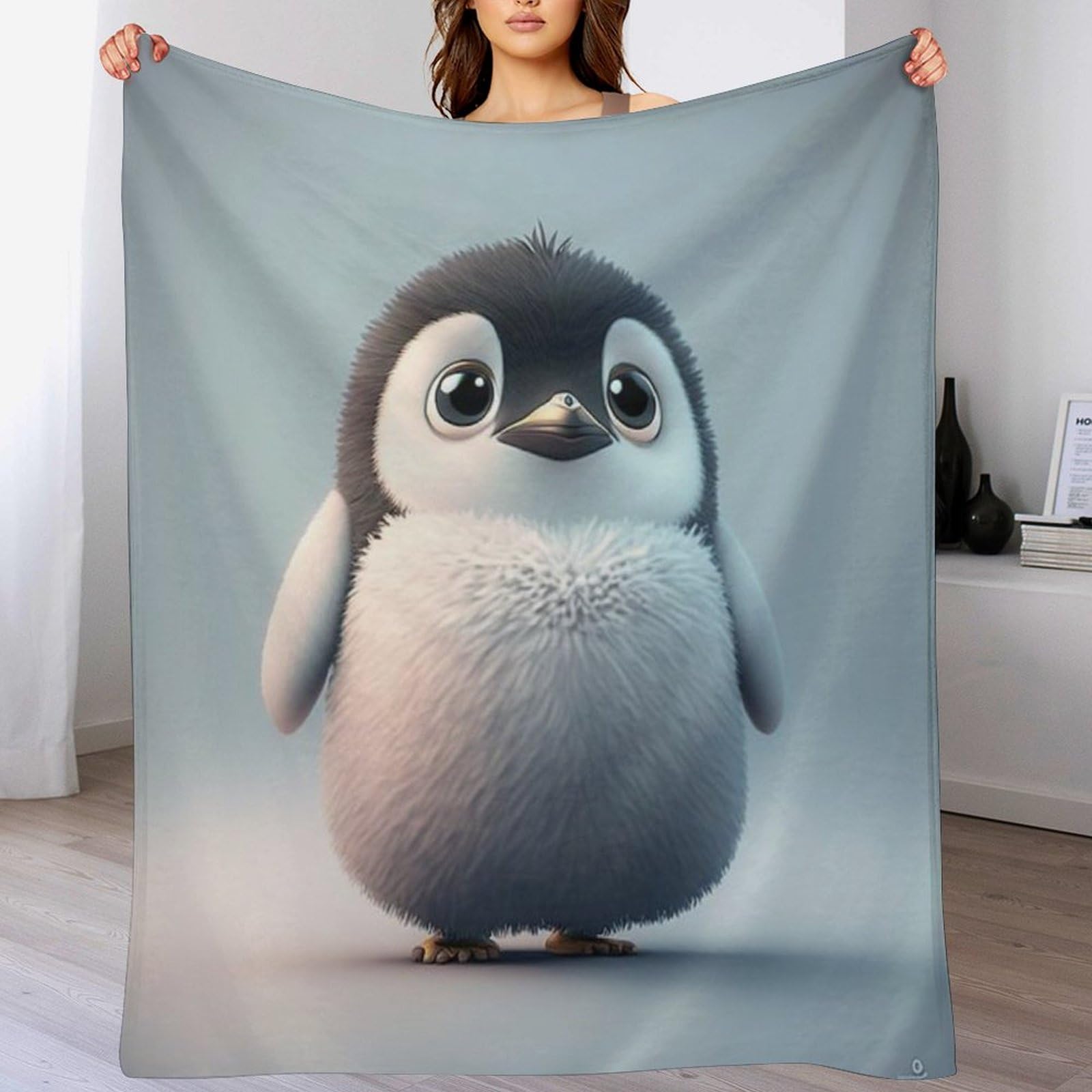 Couverture pingouin en polaire pour des soirées canapé cocooning en famille
