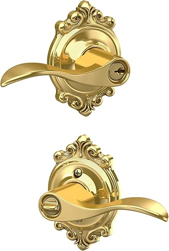 SCHLAGE - Manija Accent con cerradura que se abre con llave y una moldura Brookshire en latón brillante