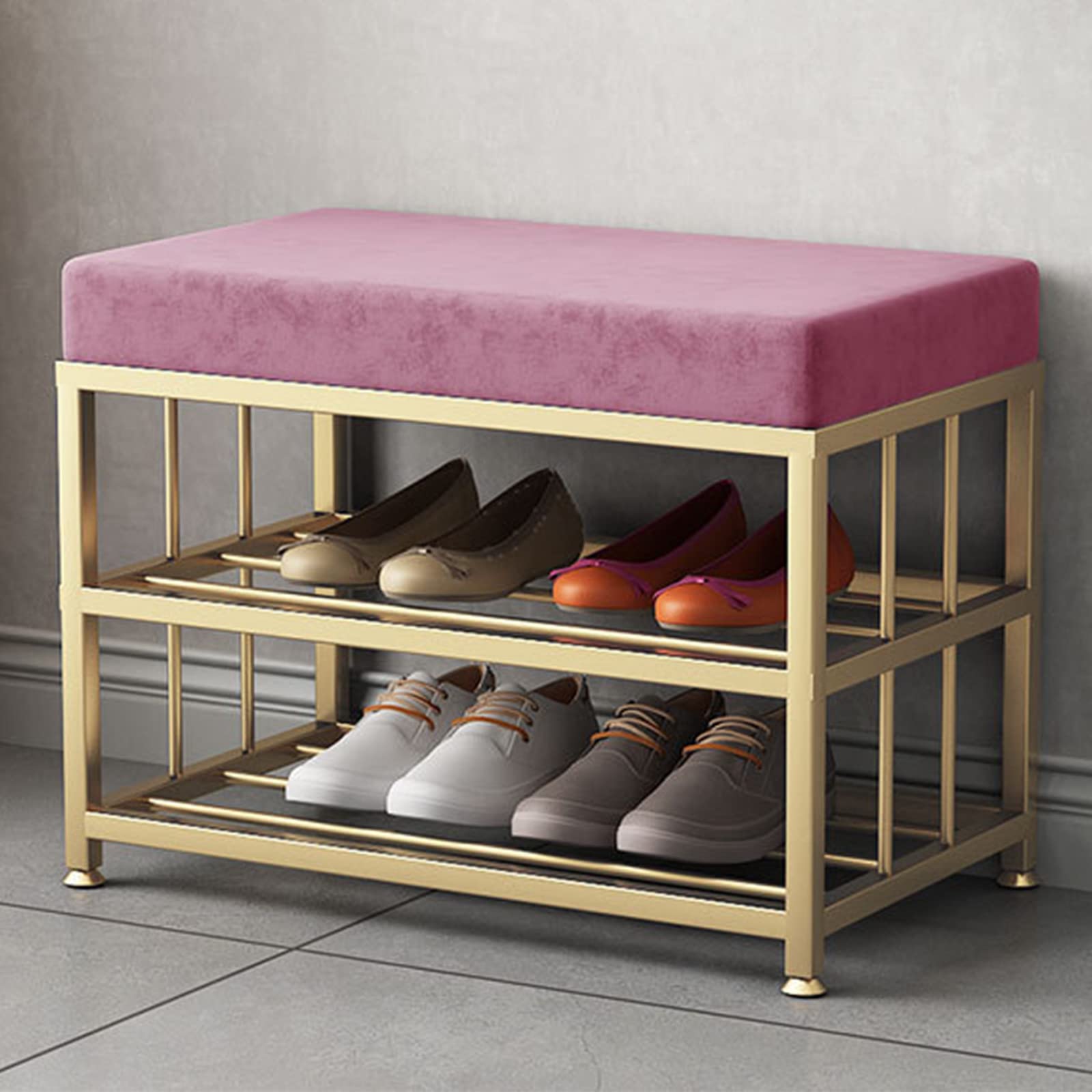 Banc à chaussures en velours rose pour un couloir d'entrée chic