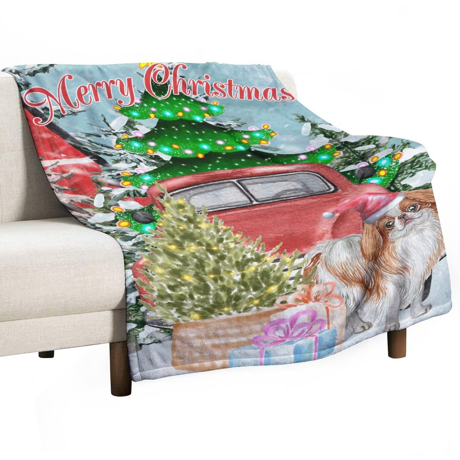 Plaid de Noël camion rouge et chien pour des soirées cocooning chaleureuses en famille