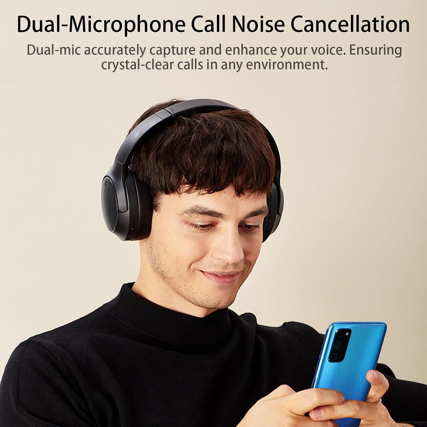A person wearing the headphones, using a smartphone, with text indicating Dual-Microphone Call Noise Cancellation.