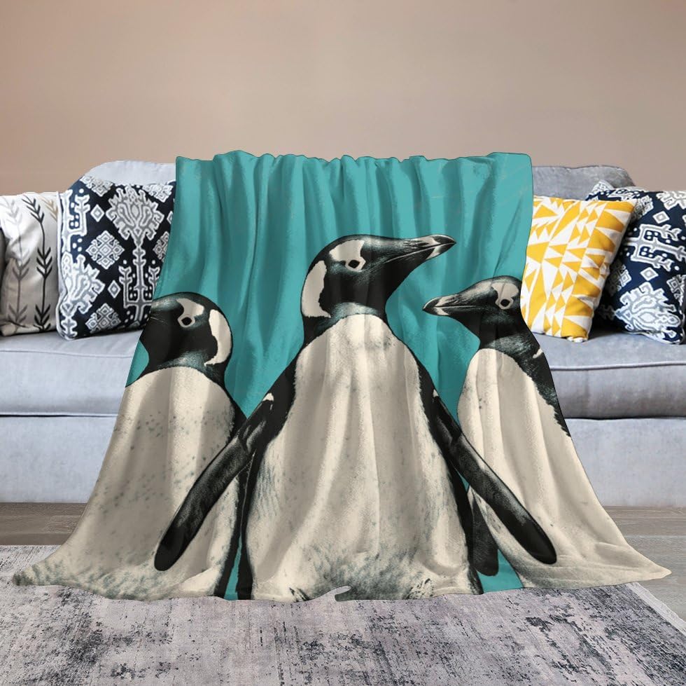 Couverture polaire ultra douce pingouins pour vos soirées cocooning sur le canapé du salon