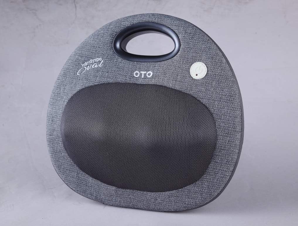 Atas view of OTO Handy Spa HS-900V massager showing the power button